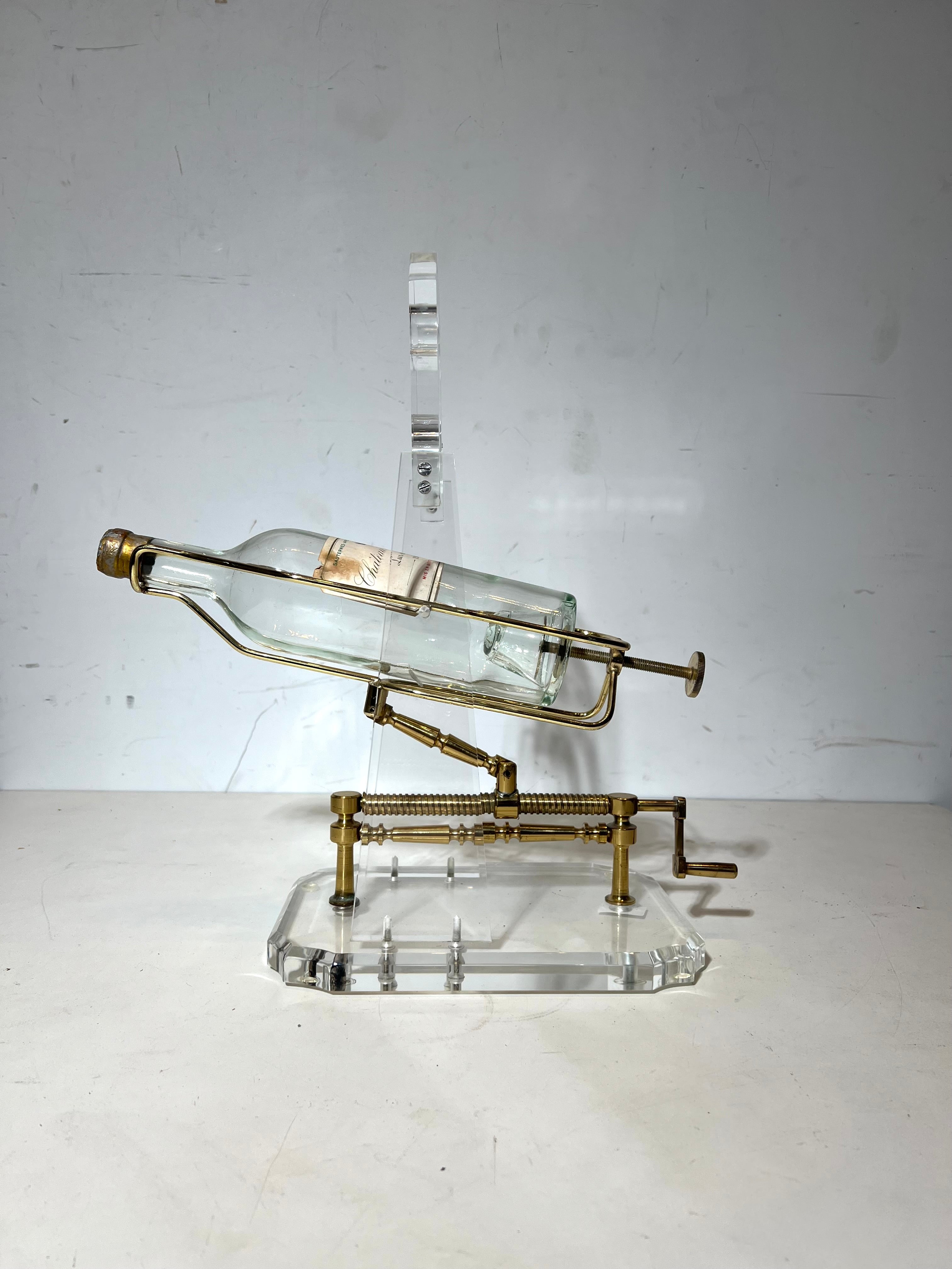 Vintage Lucite & Brass Mechanical Wine Bottle Display Stand