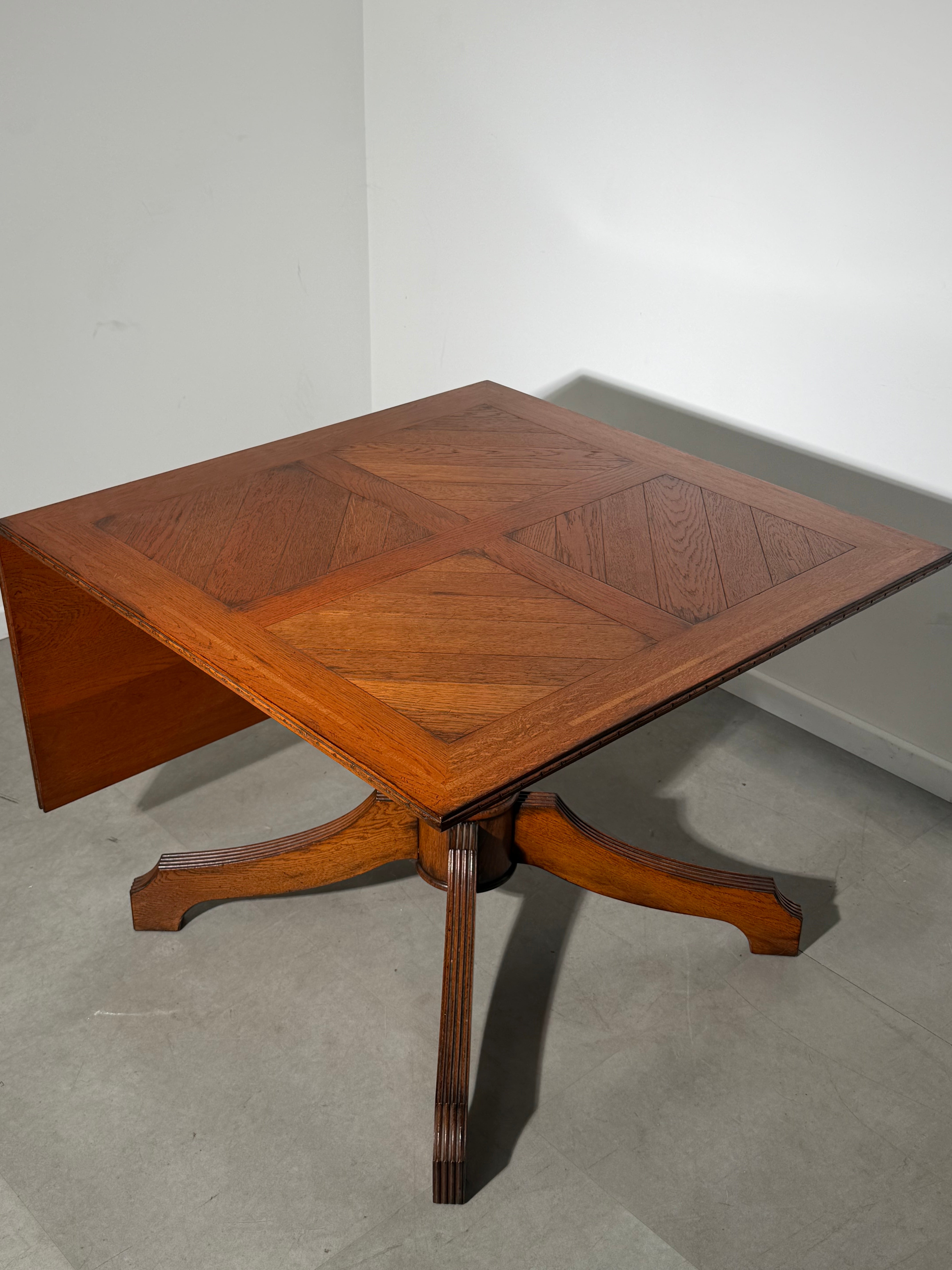 Antique Oak Dining Table with Extendable Leaf