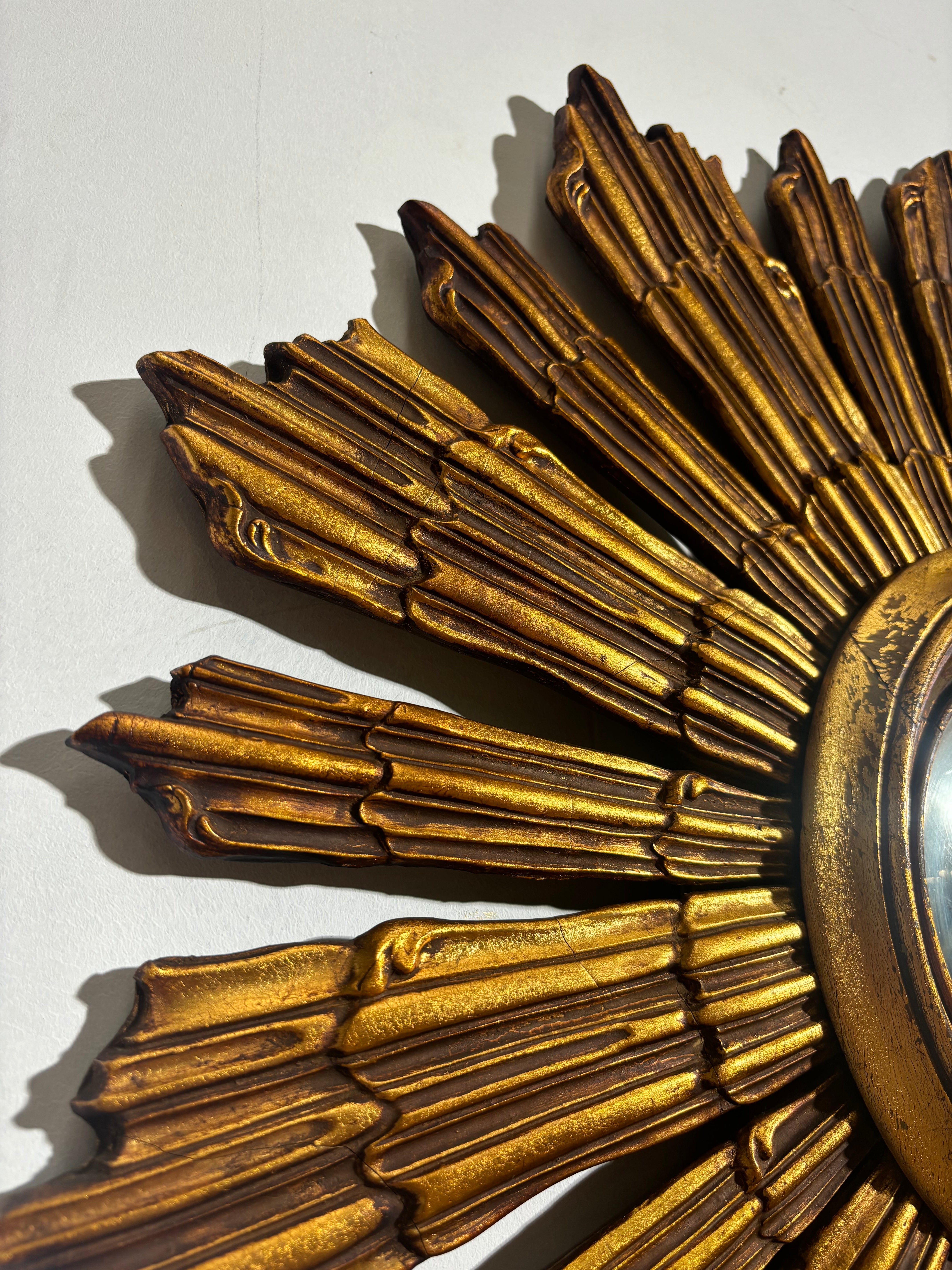 Vintage sunburst convex mirror