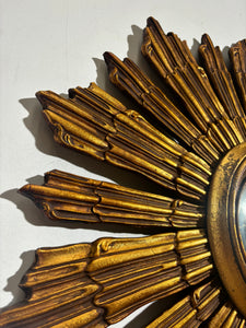 Vintage sunburst convex mirror