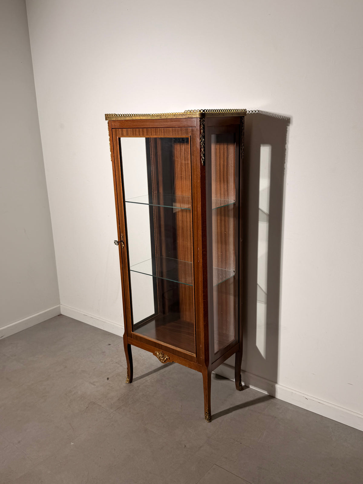 Louis XVI Style Glass Display Cabinet with Decorative Metal Mounts