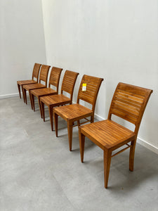 Set of six teak dining chairs