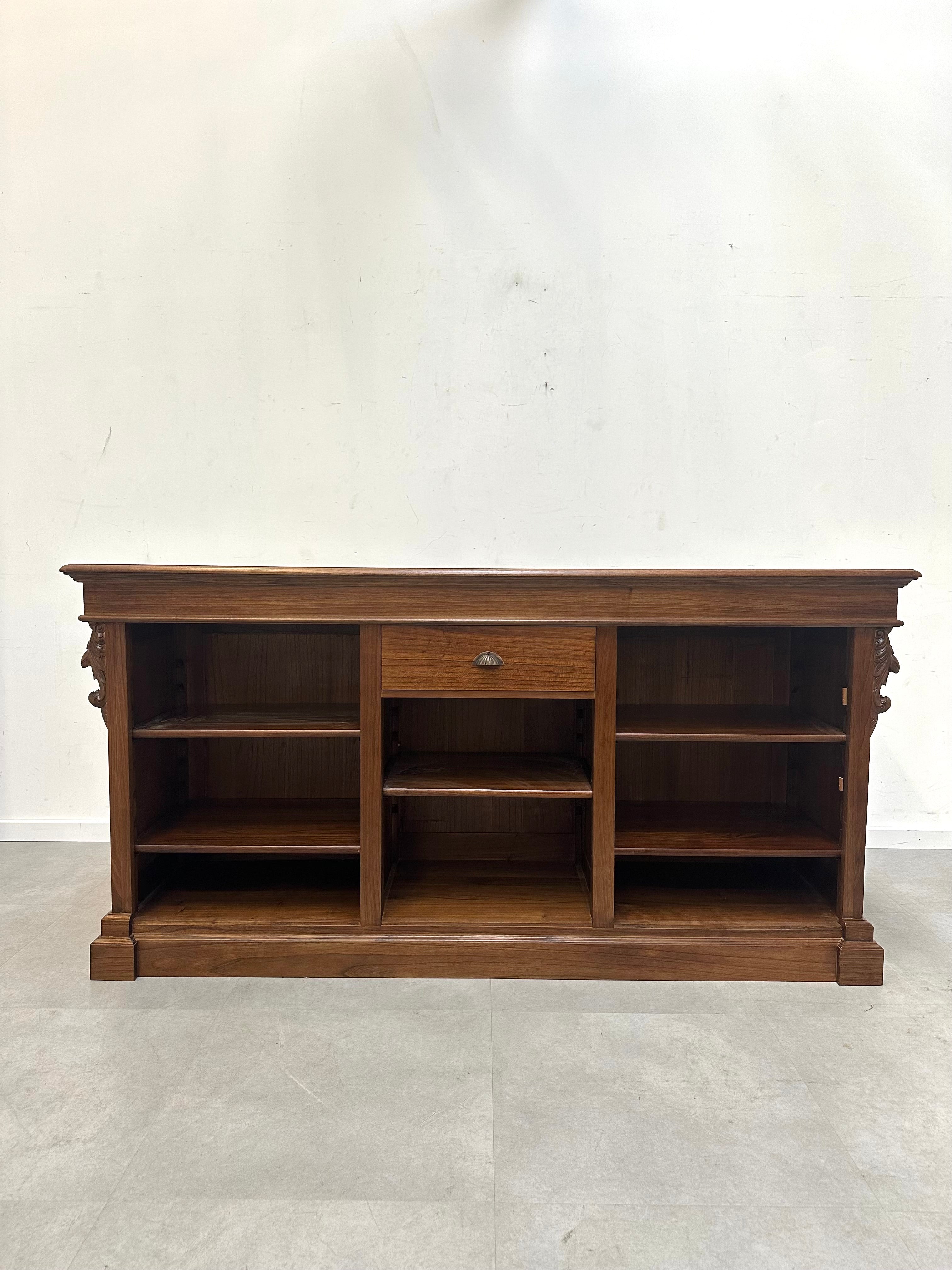 Antique handcarved counter with bookcase