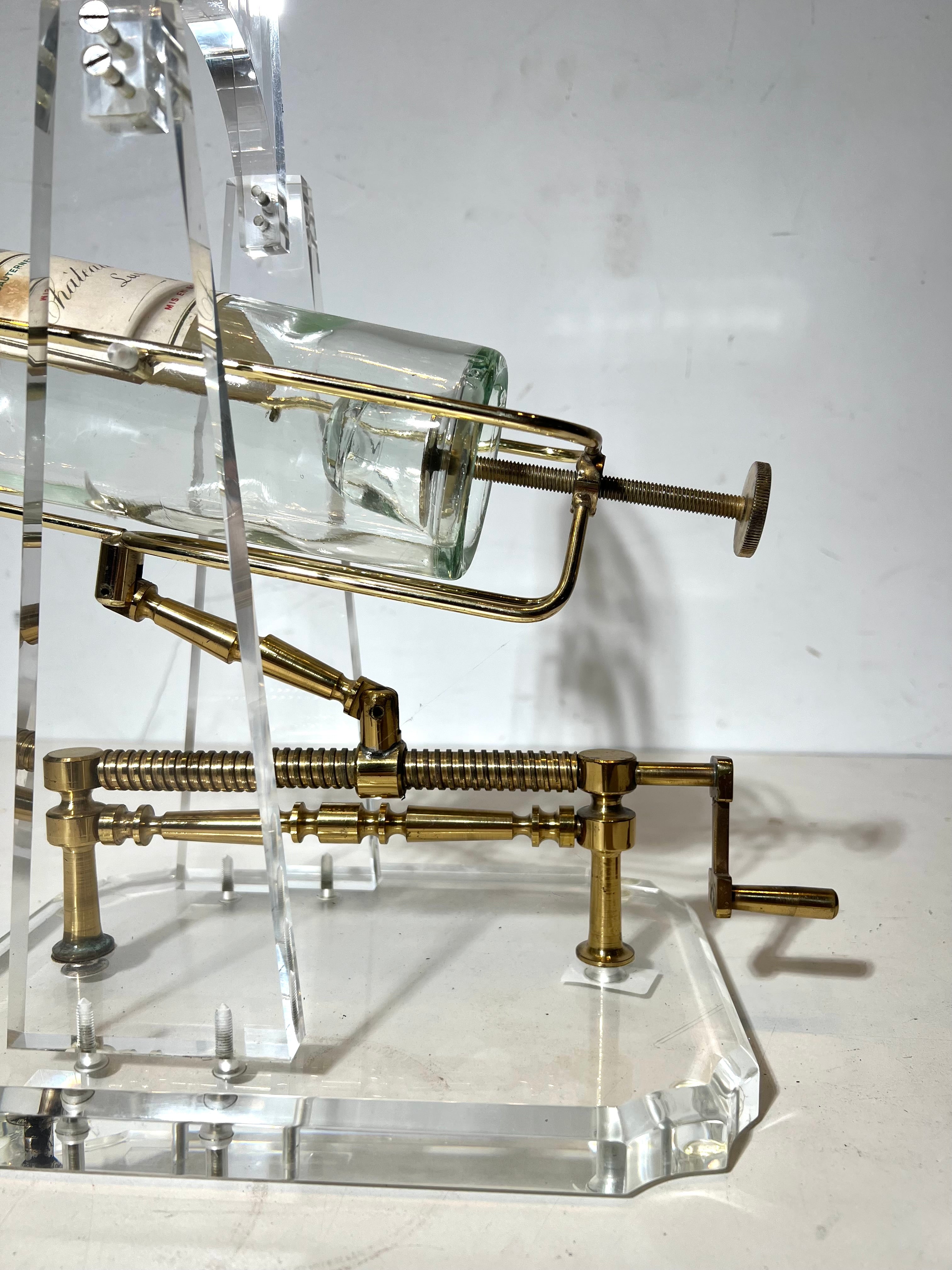 Vintage Lucite & Brass Mechanical Wine Bottle Display Stand