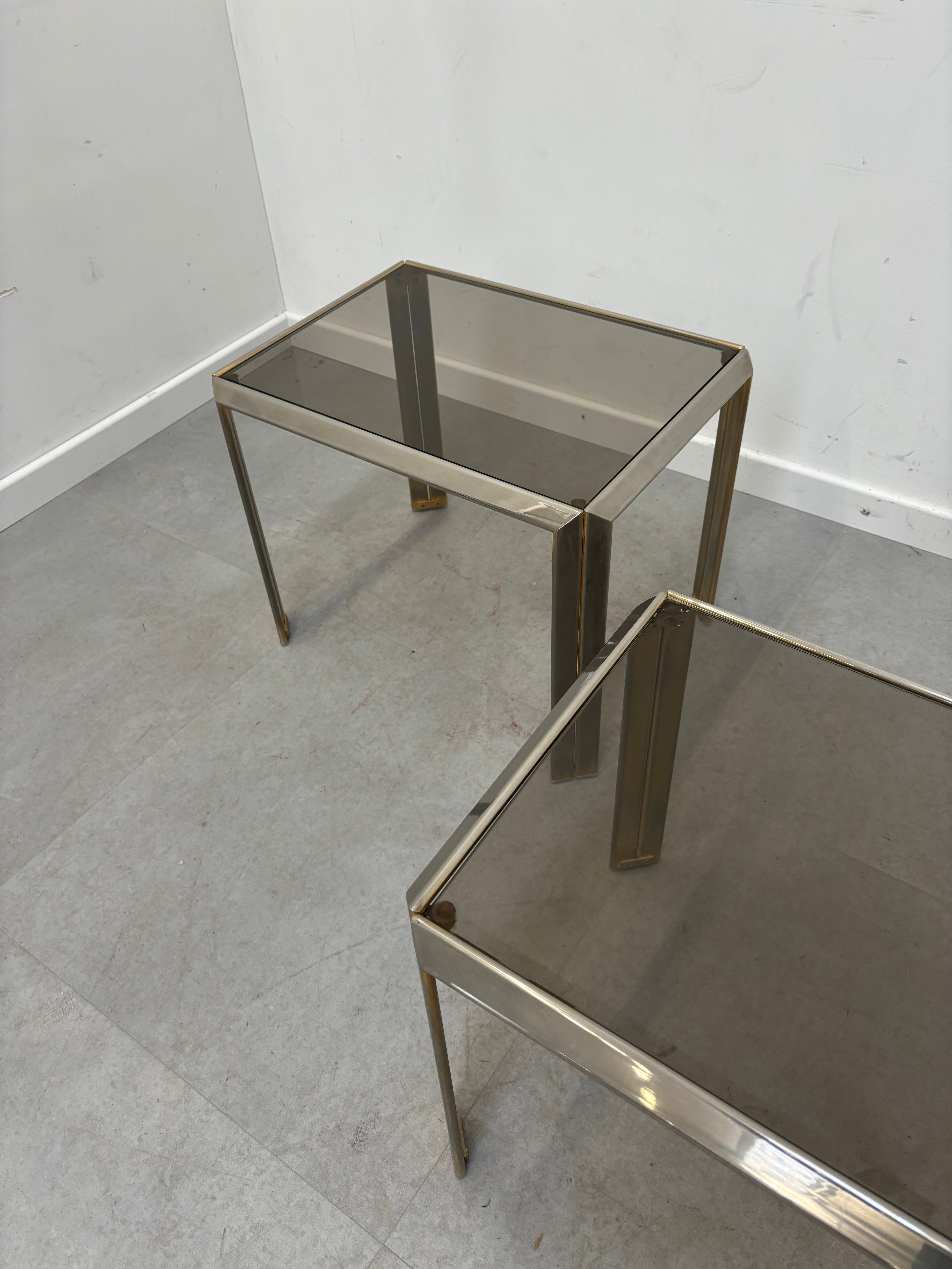 Pair sidetables brass and fume glass