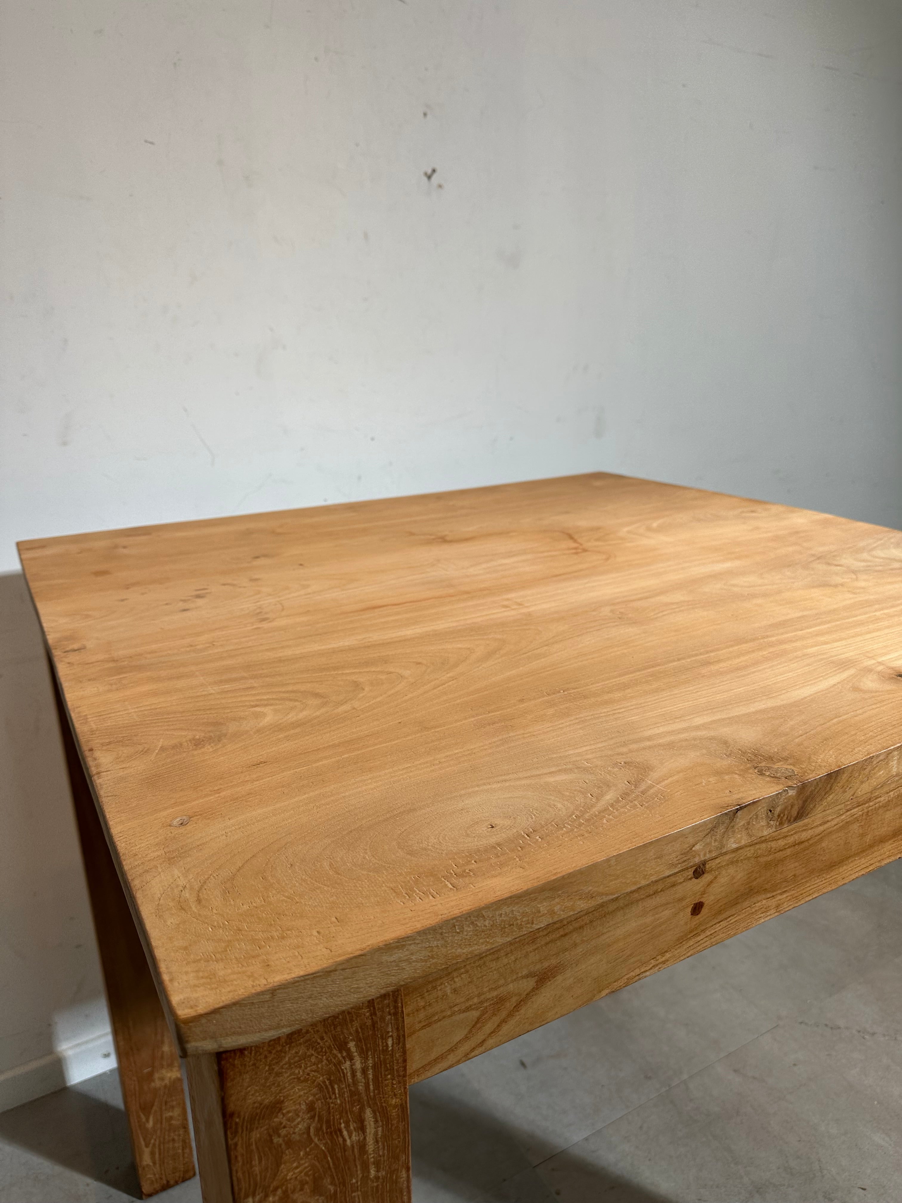 Teak dining table