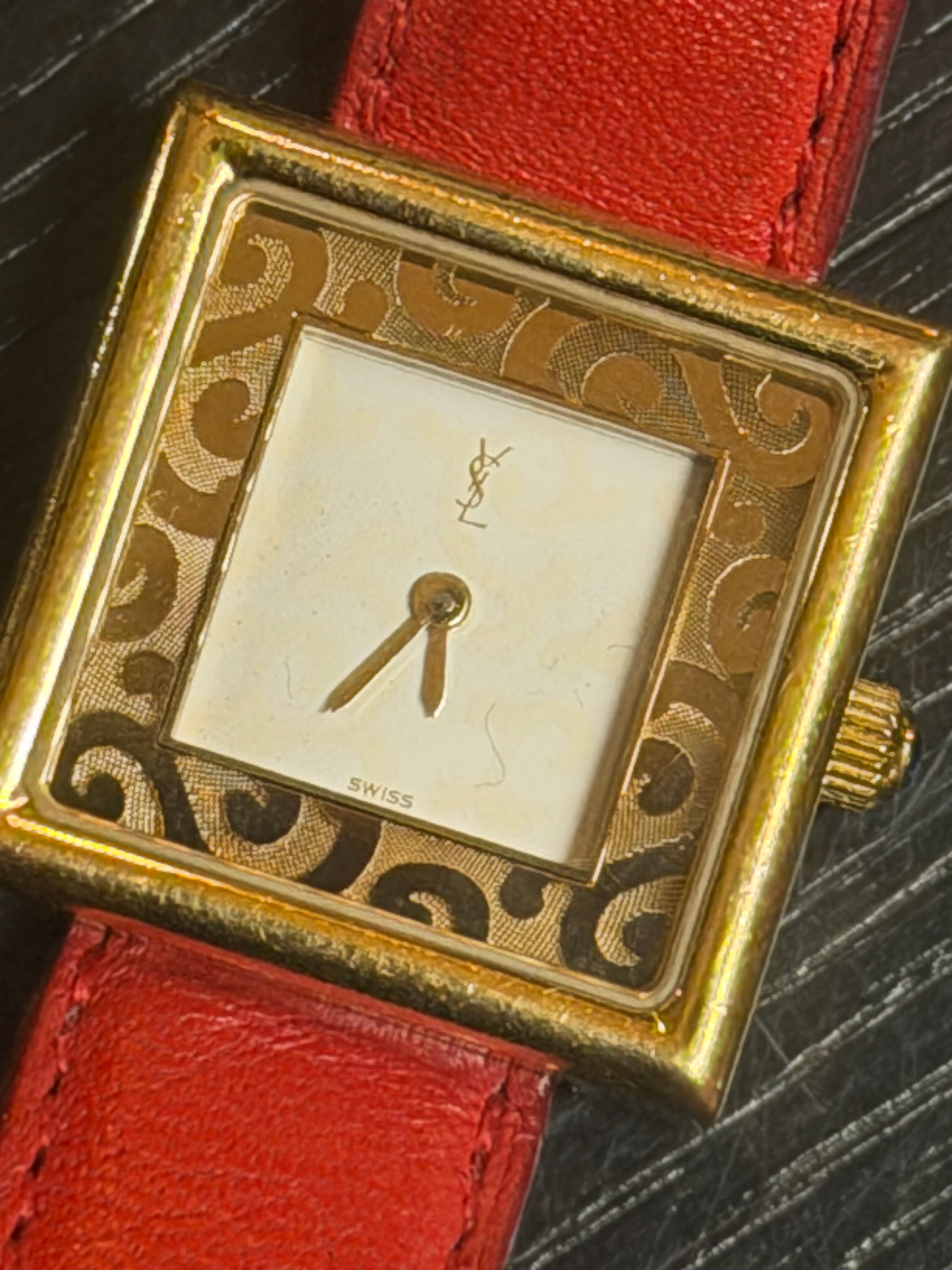 Vintage Yves Saint Laurent Quartz Watch – Gold Tone Case, Red Leather Strap – Swiss Made