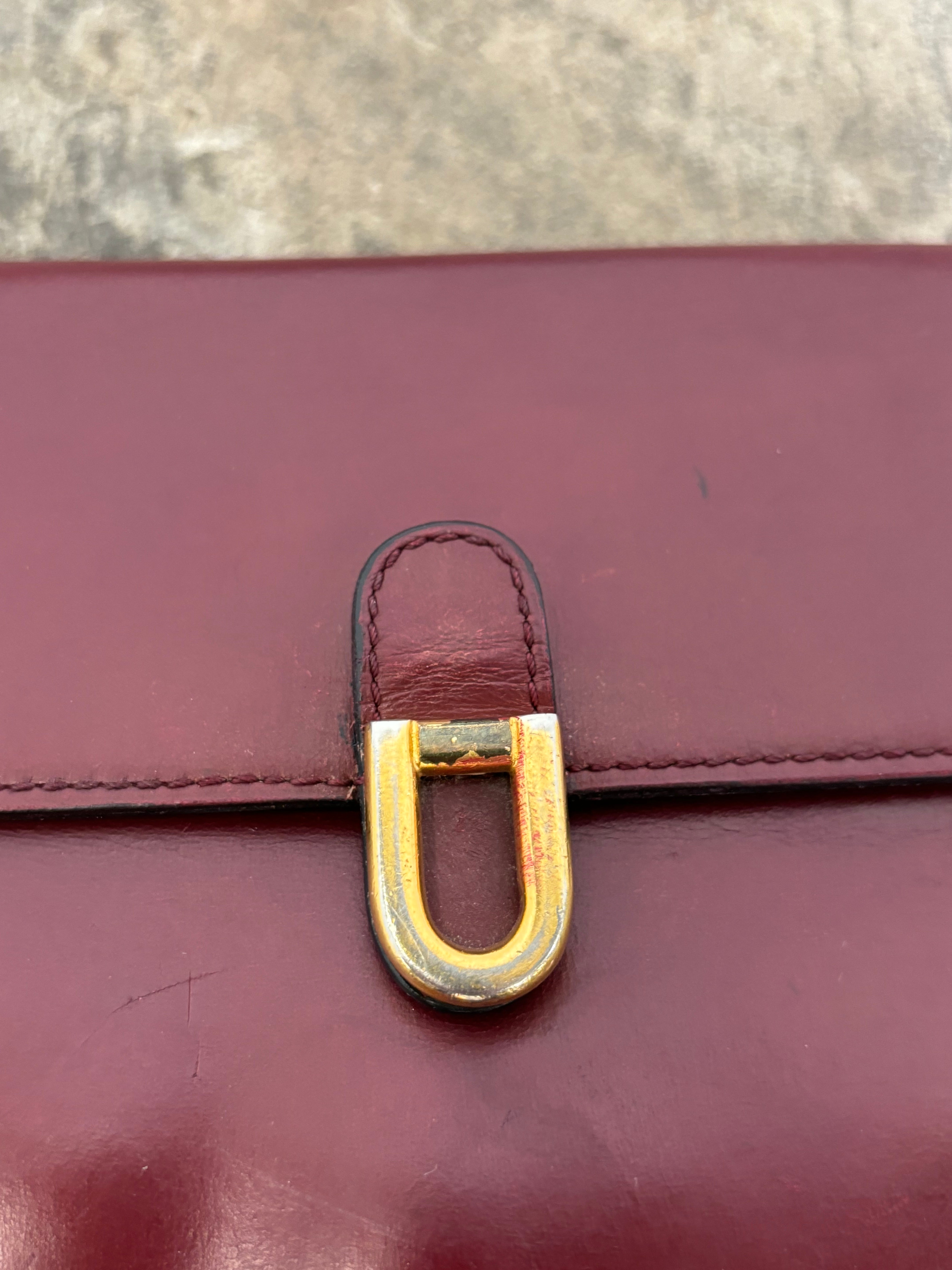 Delvaux “Starlette” Bordeaux crossbody bag