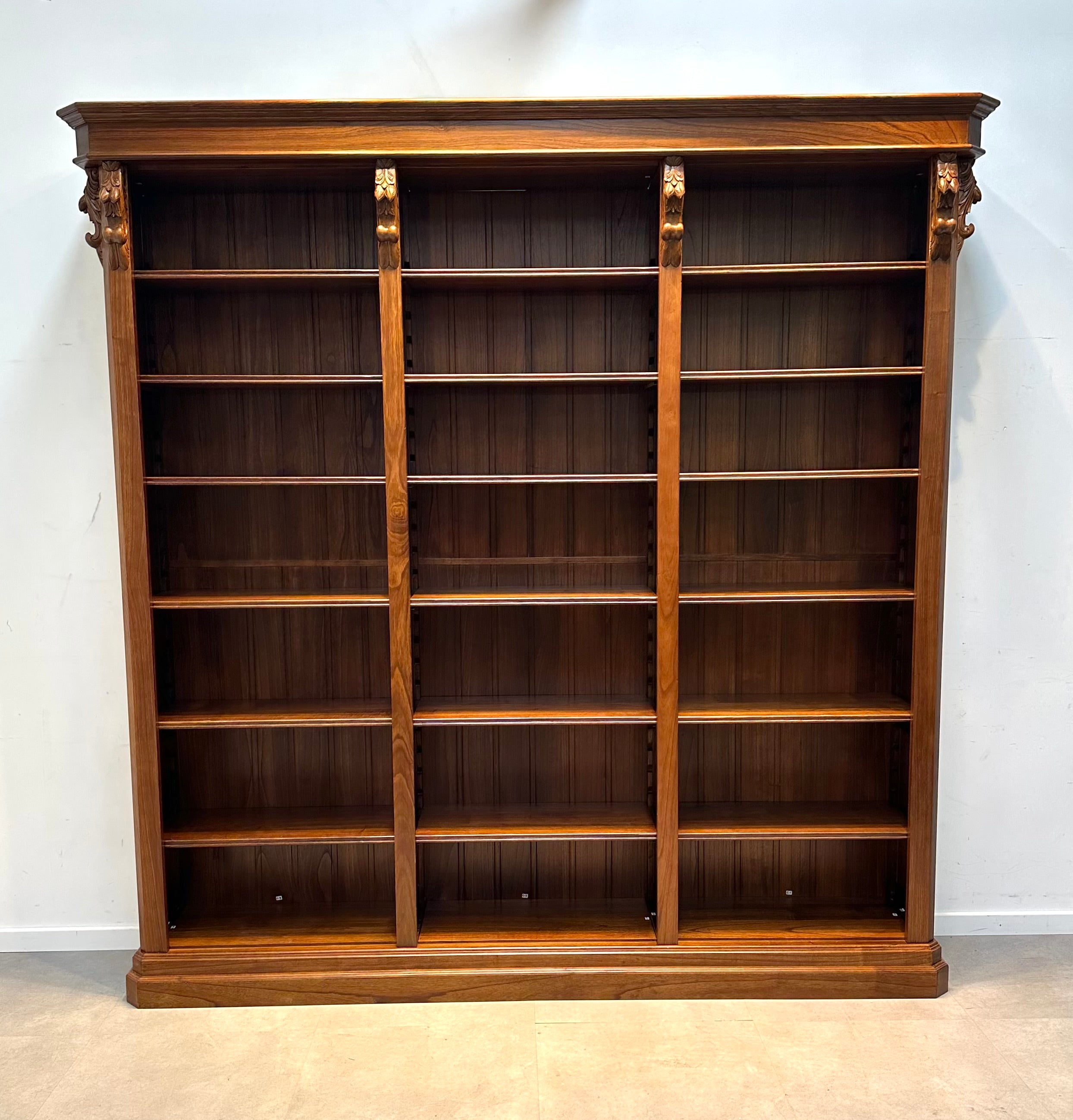Antique handcarved counter with bookcase