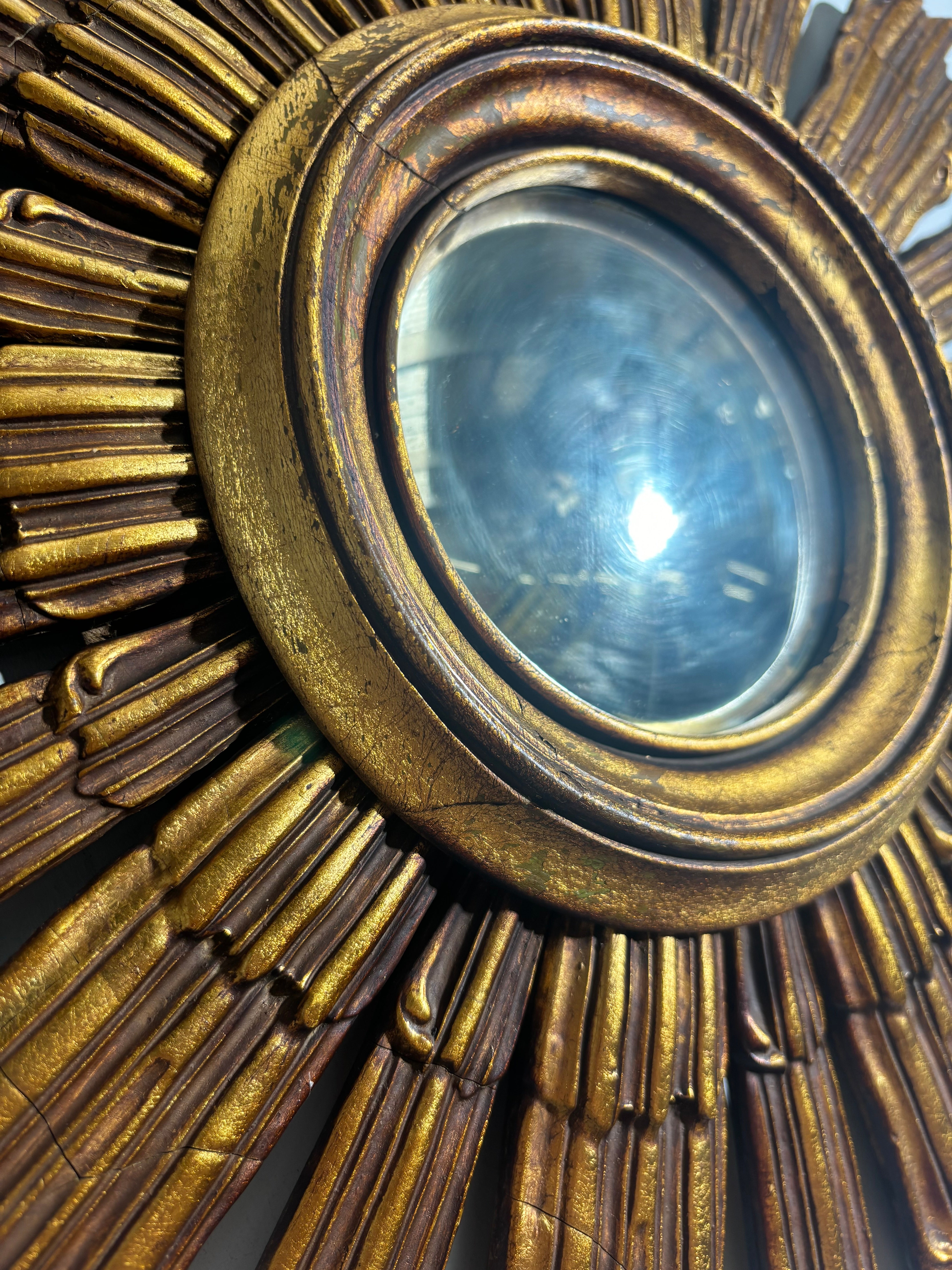 Vintage sunburst convex mirror