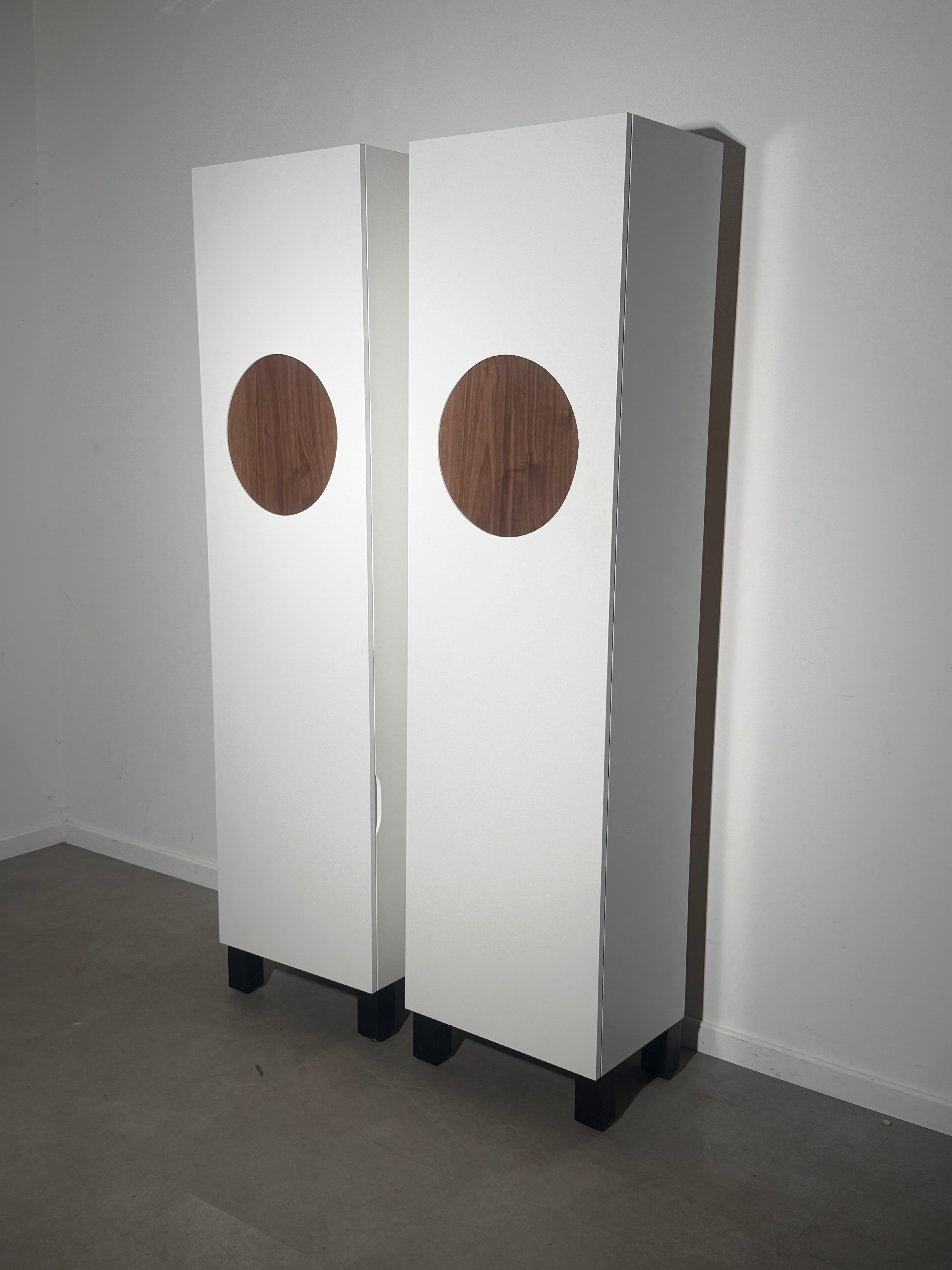 Pair of Contemporary White Wardrobes with Walnut Circular Detail