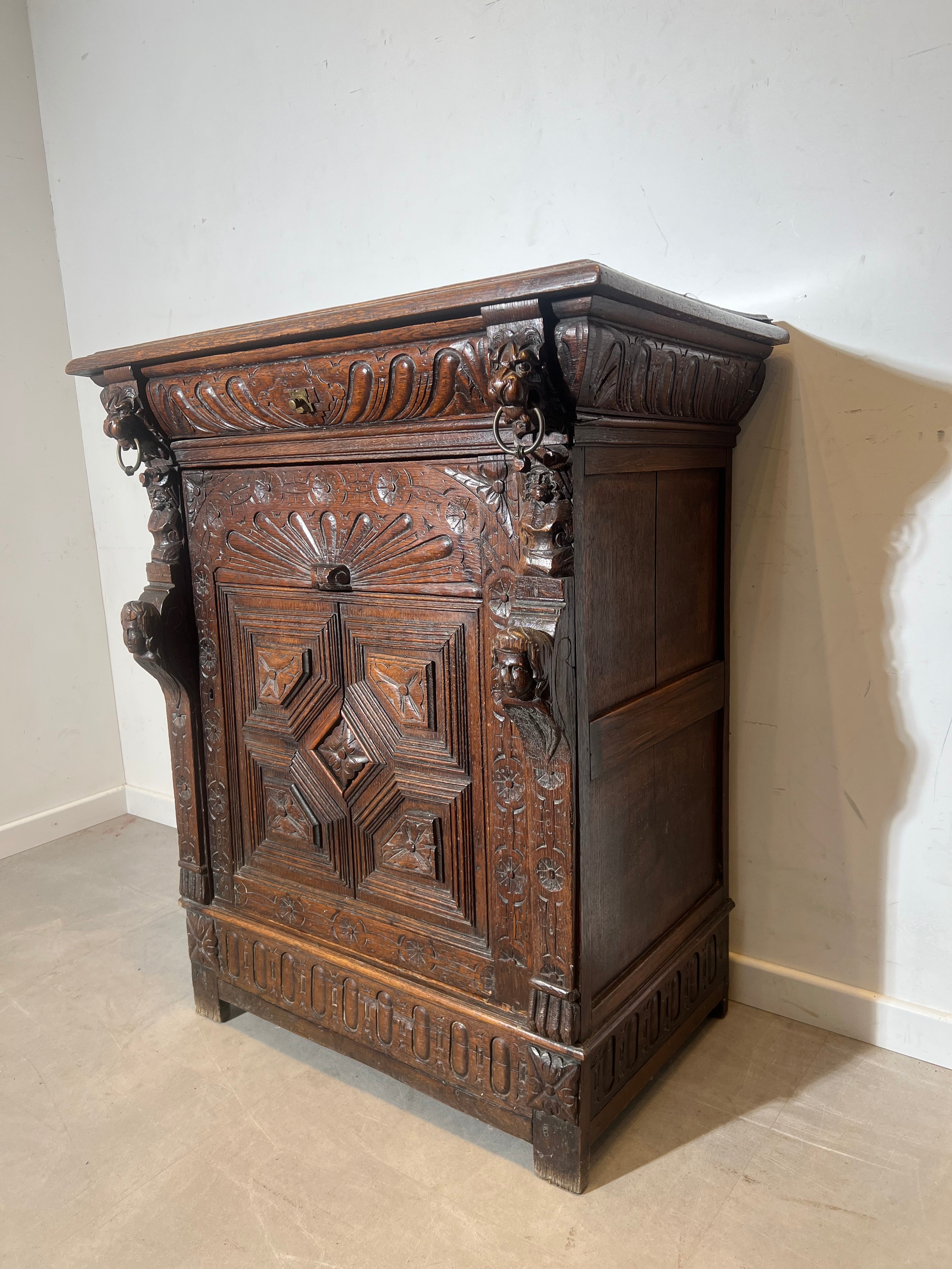 Antique Hand-Carved Oak Cabinet