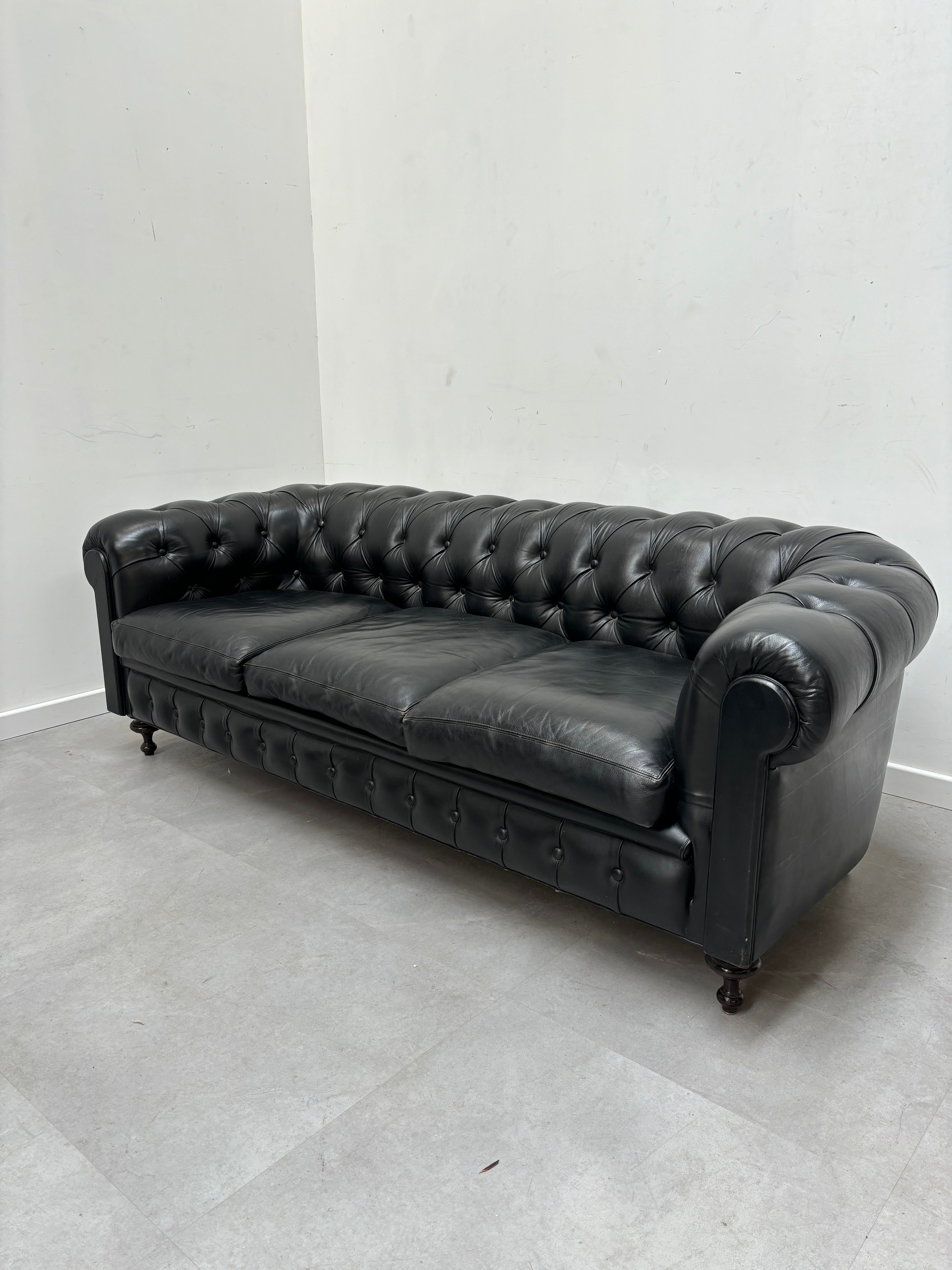 Chesterfield black leather three seater