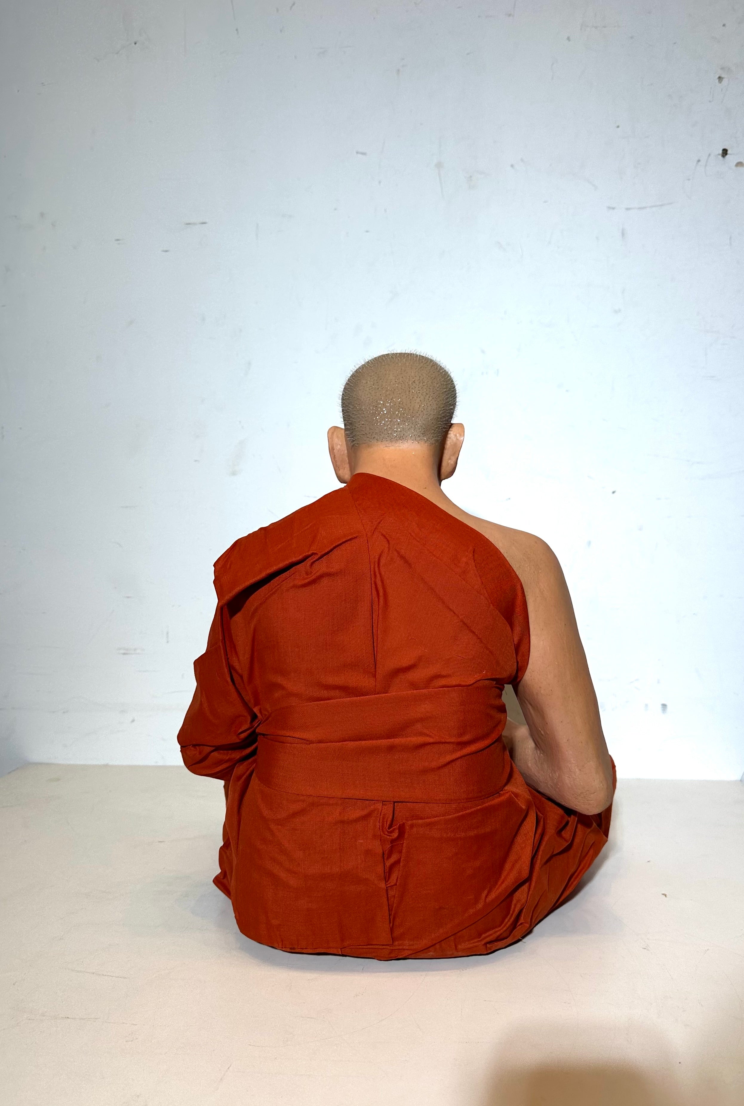 Sculpture plus vraie que nature d'un bouddhiste