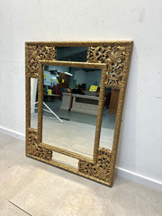 Miroir doré de style antique