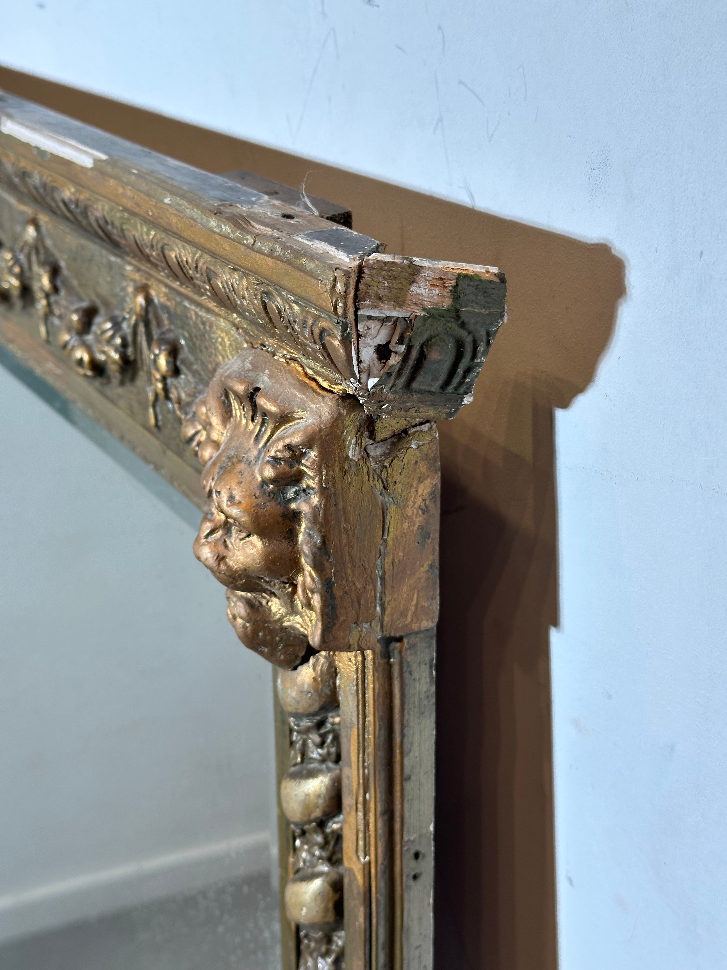 Large Antique Giltwood Mirror with Lion Mask