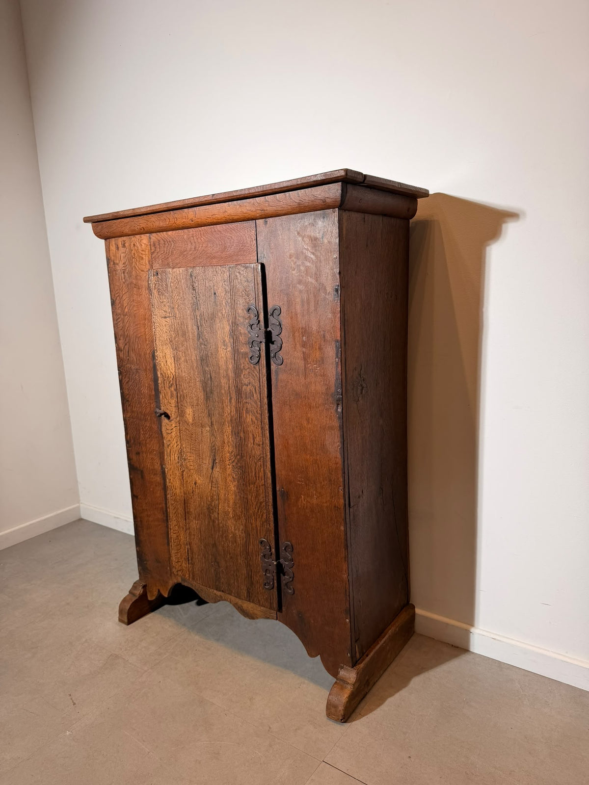 19th-Century Wooden Cabinet with Decorative Iron Hinges — 134 × 85 × 42 cm