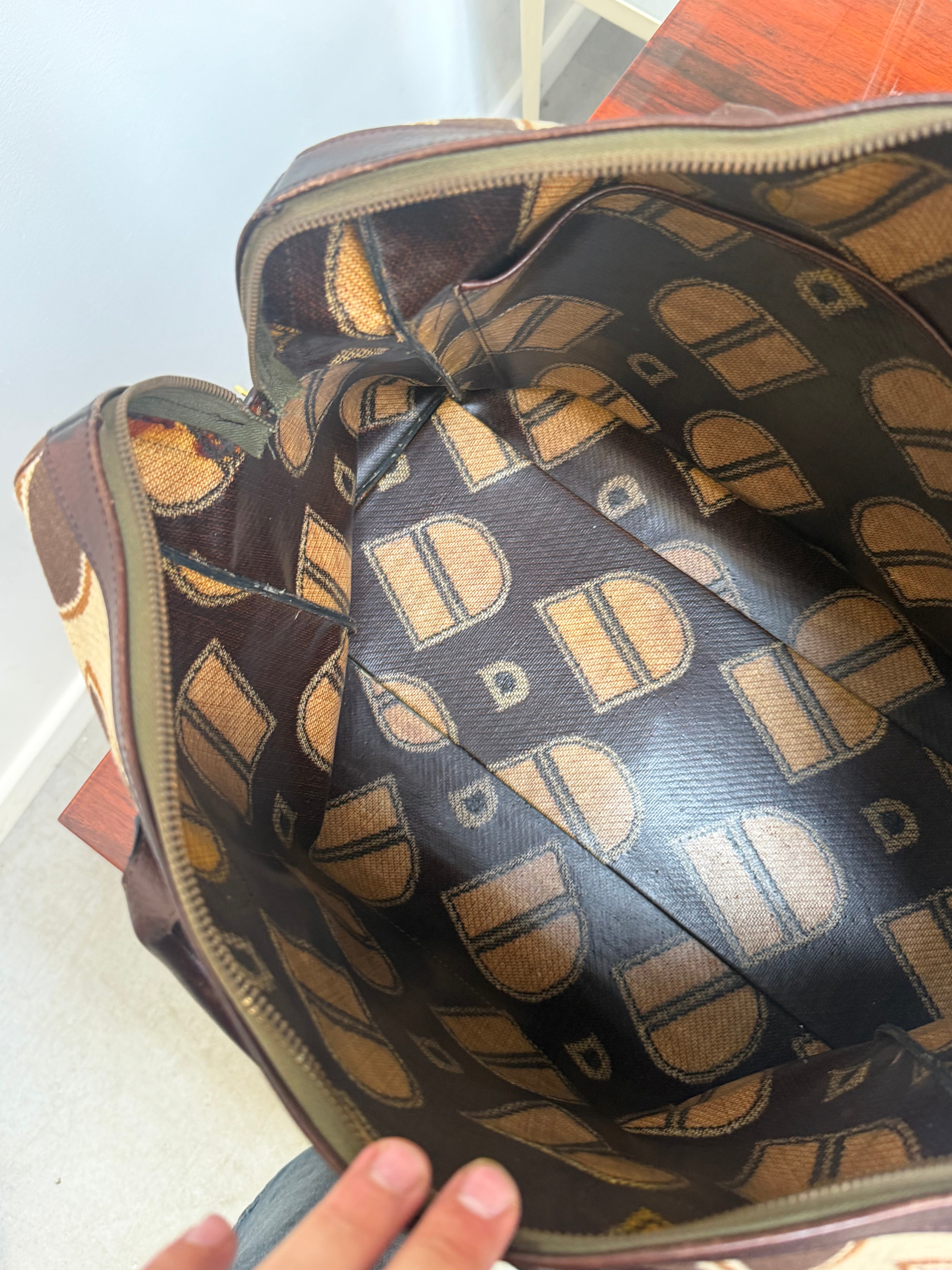 Delvaux 1973 Monogram Canvas Travel Bag – Top Handle