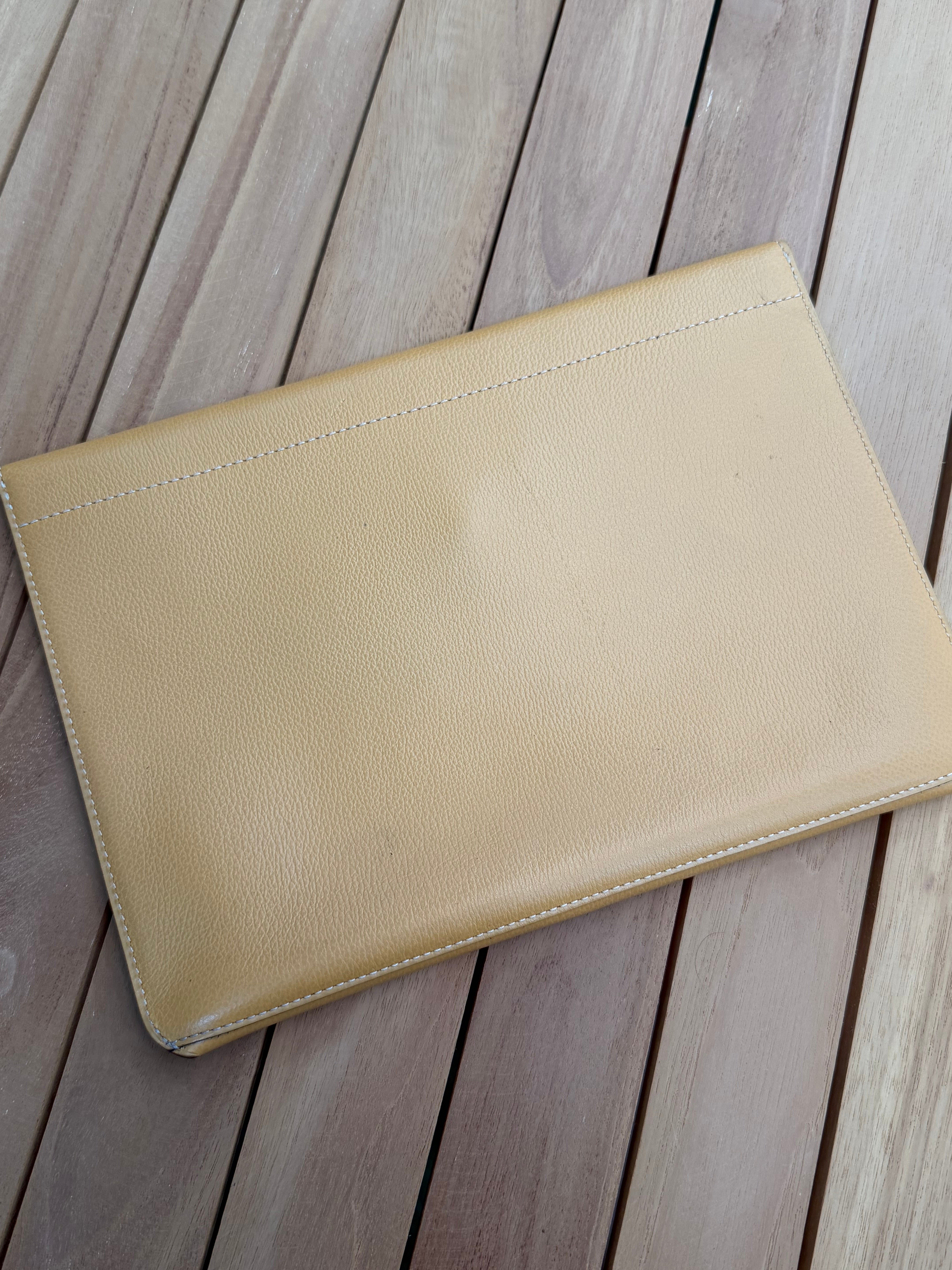 Delvaux “Fusée” Clutch – Cognac Leather