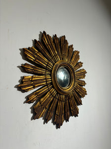 Vintage sunburst convex mirror