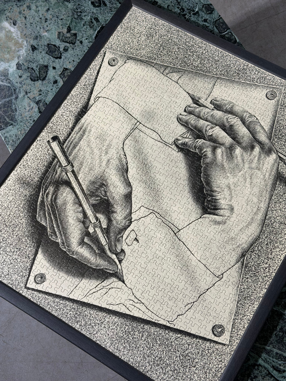 M. C. Escher “Drawing Hands” – Framed Puzzle, 55 × 65 cm