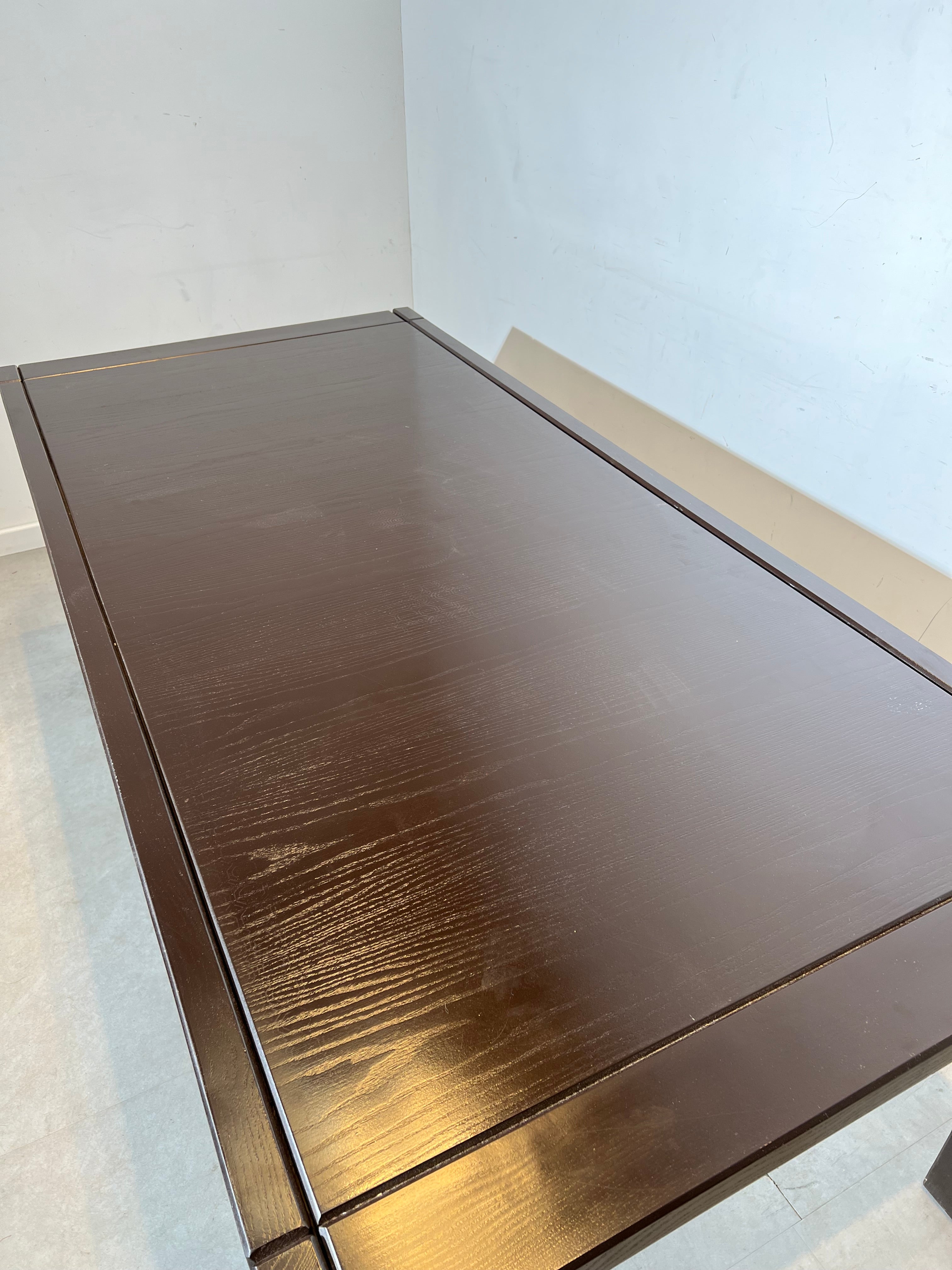 Extendable dark oak dining table with 6 rush chairs