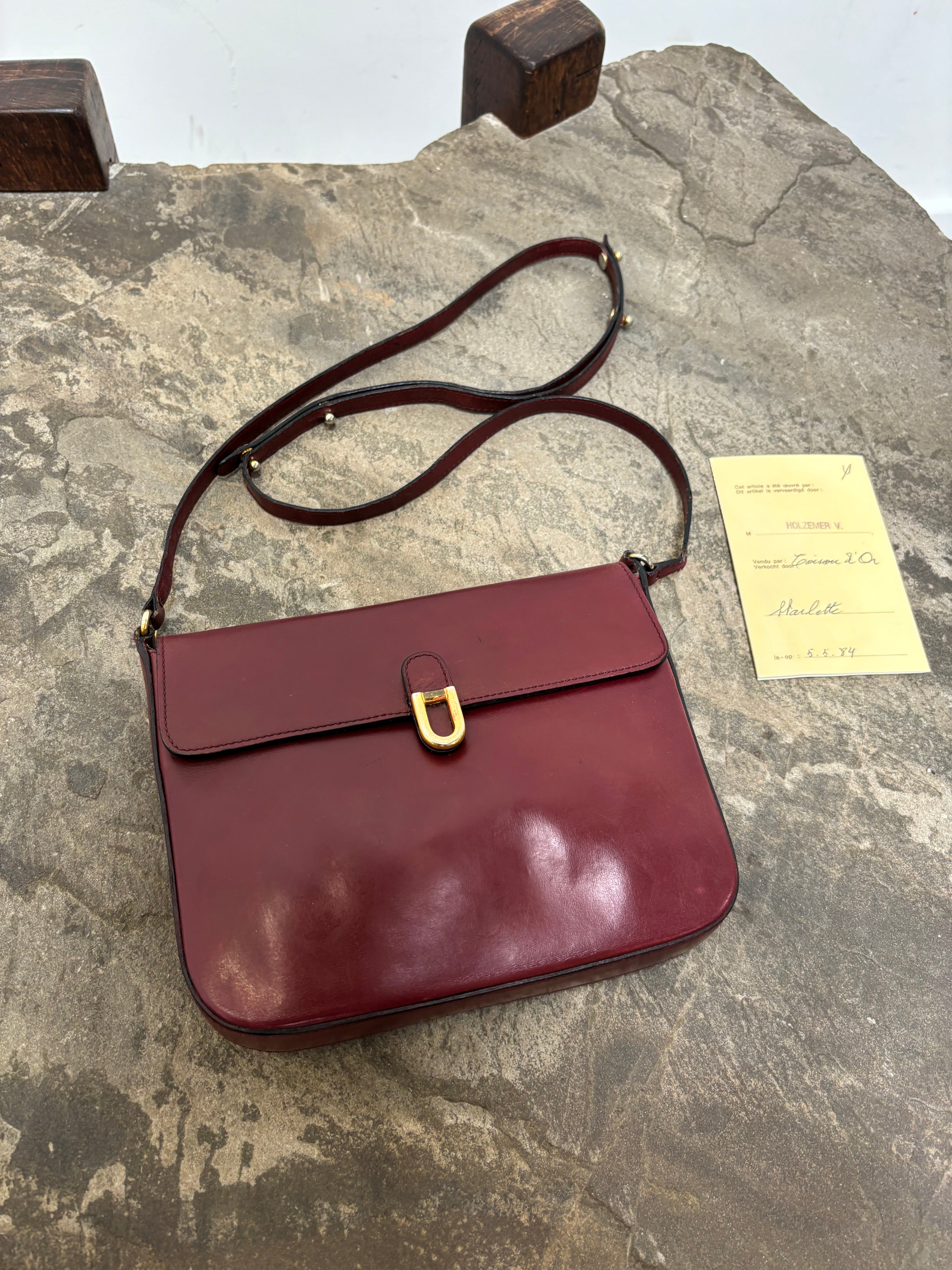 Delvaux “Starlette” Bordeaux crossbody bag