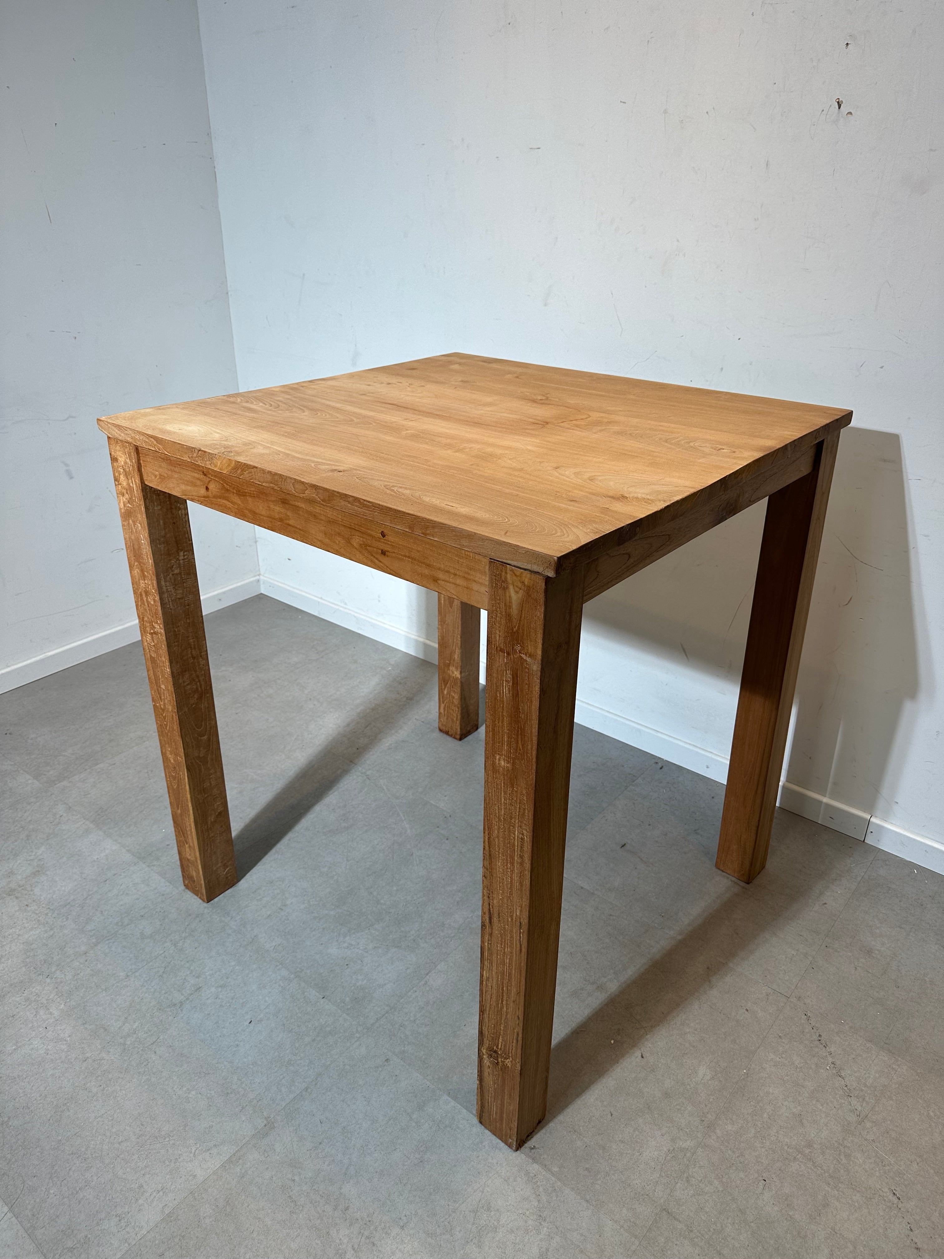 Teak dining table