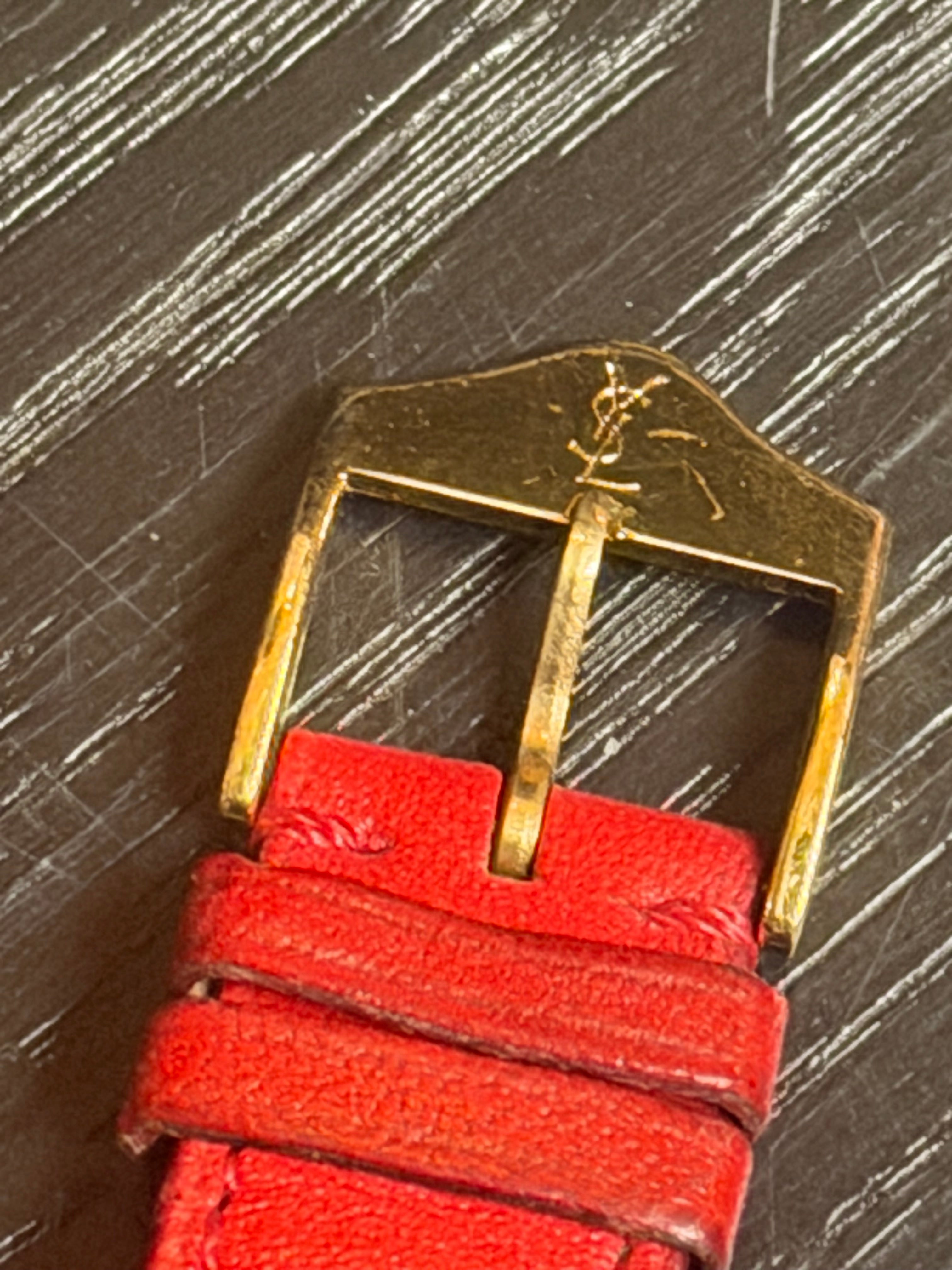 Vintage Yves Saint Laurent Quartz Watch – Gold Tone Case, Red Leather Strap – Swiss Made