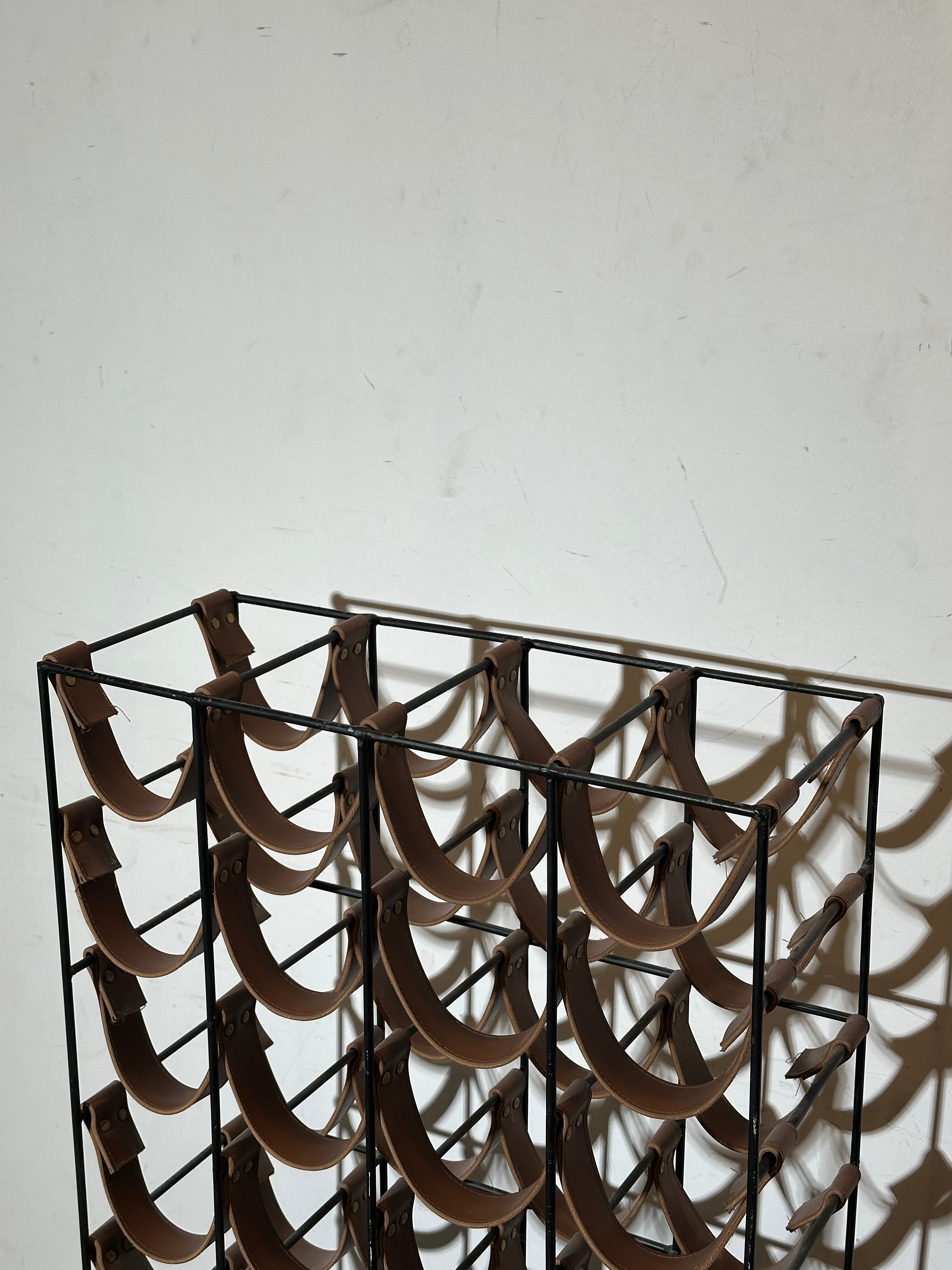 Vintage industrial leather wine rack