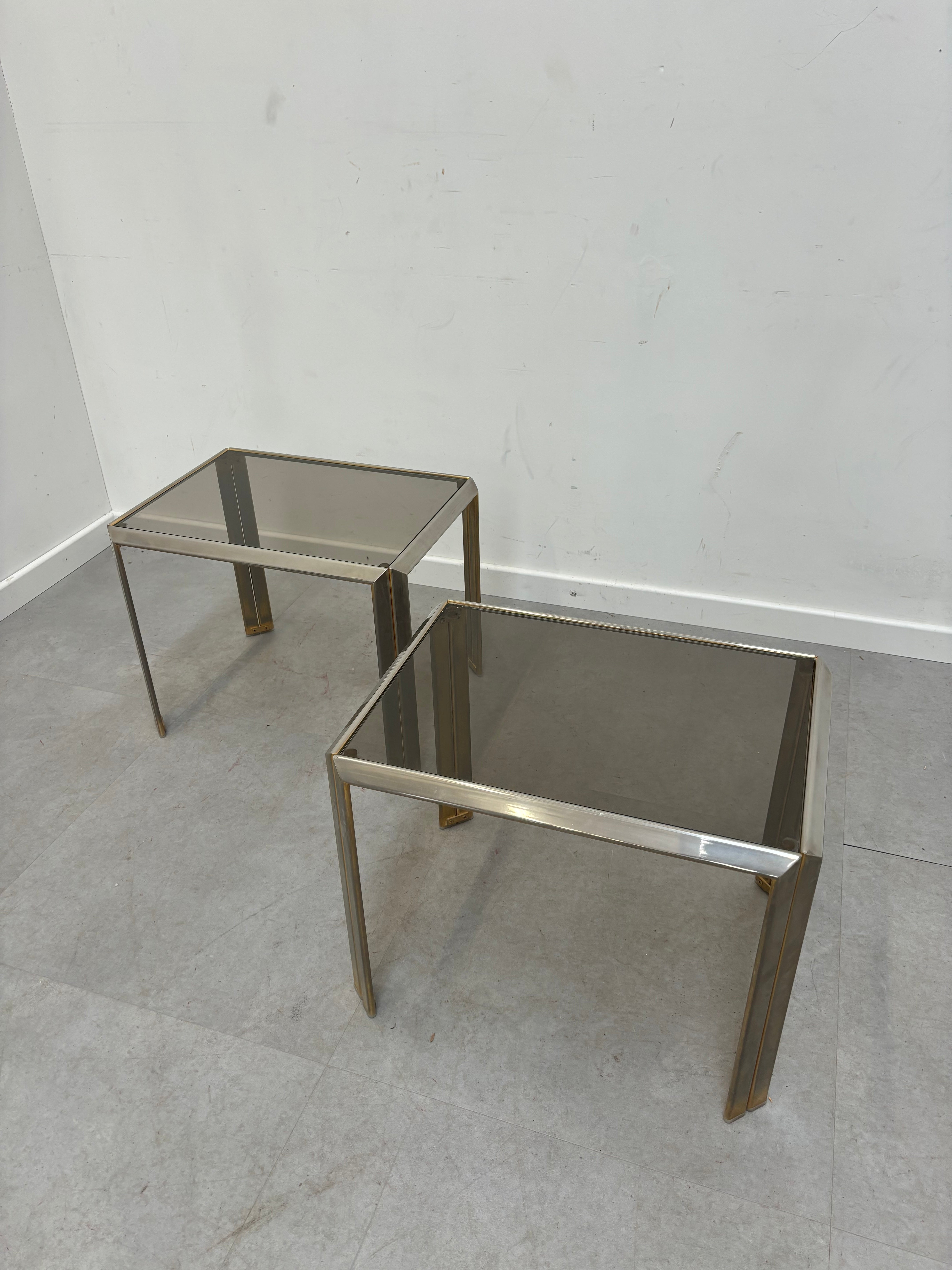 Pair sidetables brass and fume glass