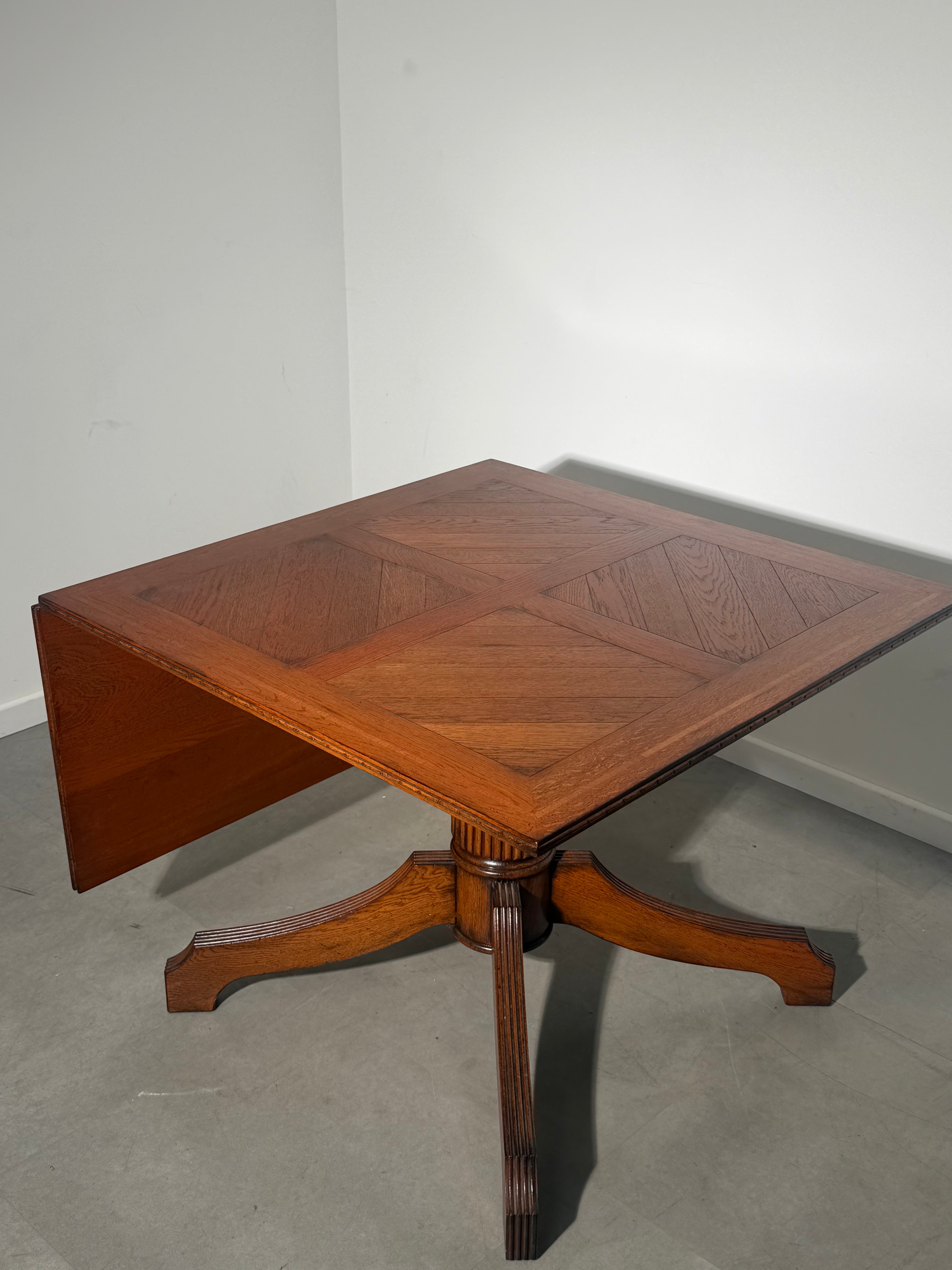 Antique Oak Dining Table with Extendable Leaf
