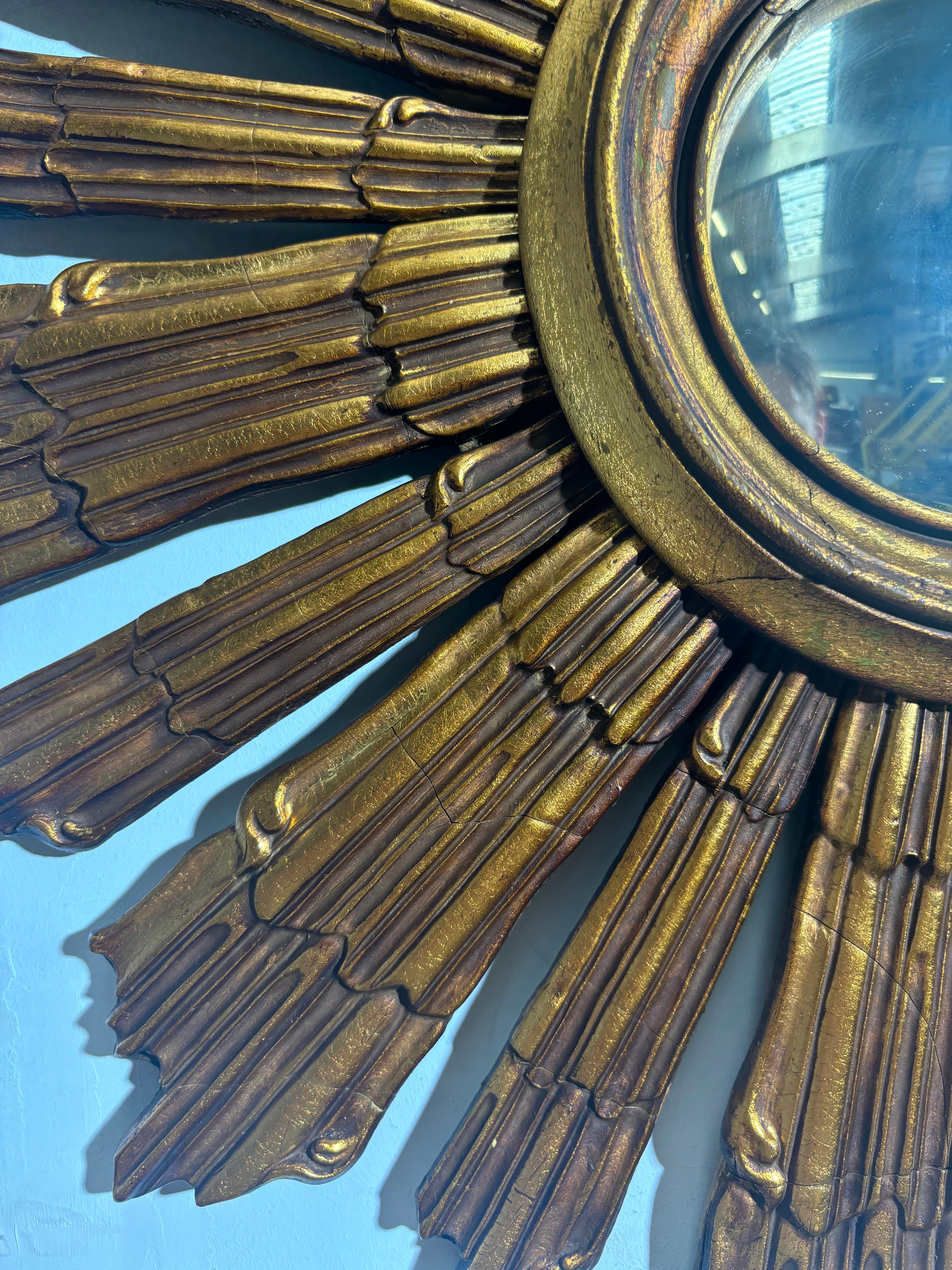 Vintage sunburst convex mirror