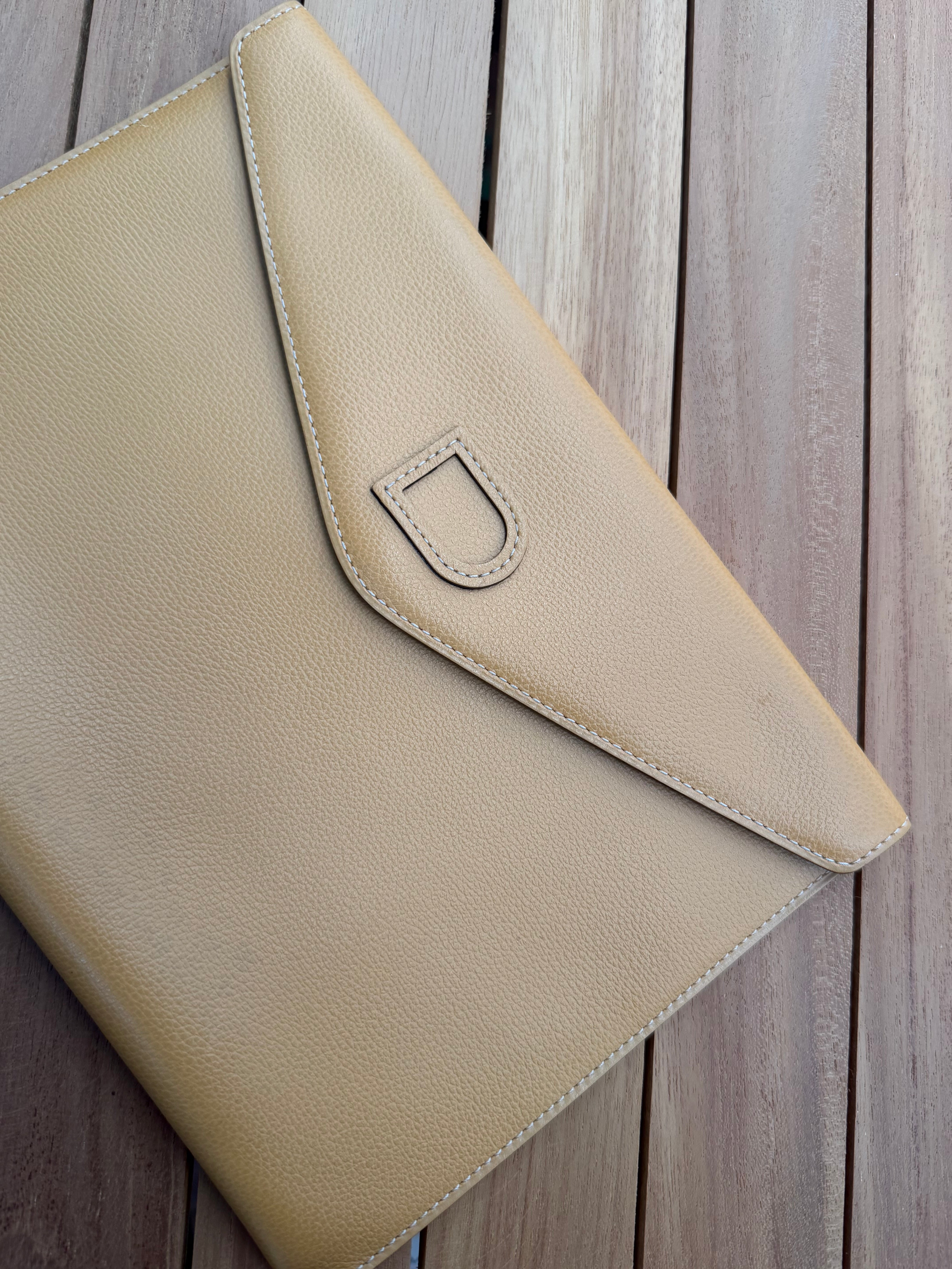 Delvaux “Fusée” Clutch – Cognac Leather