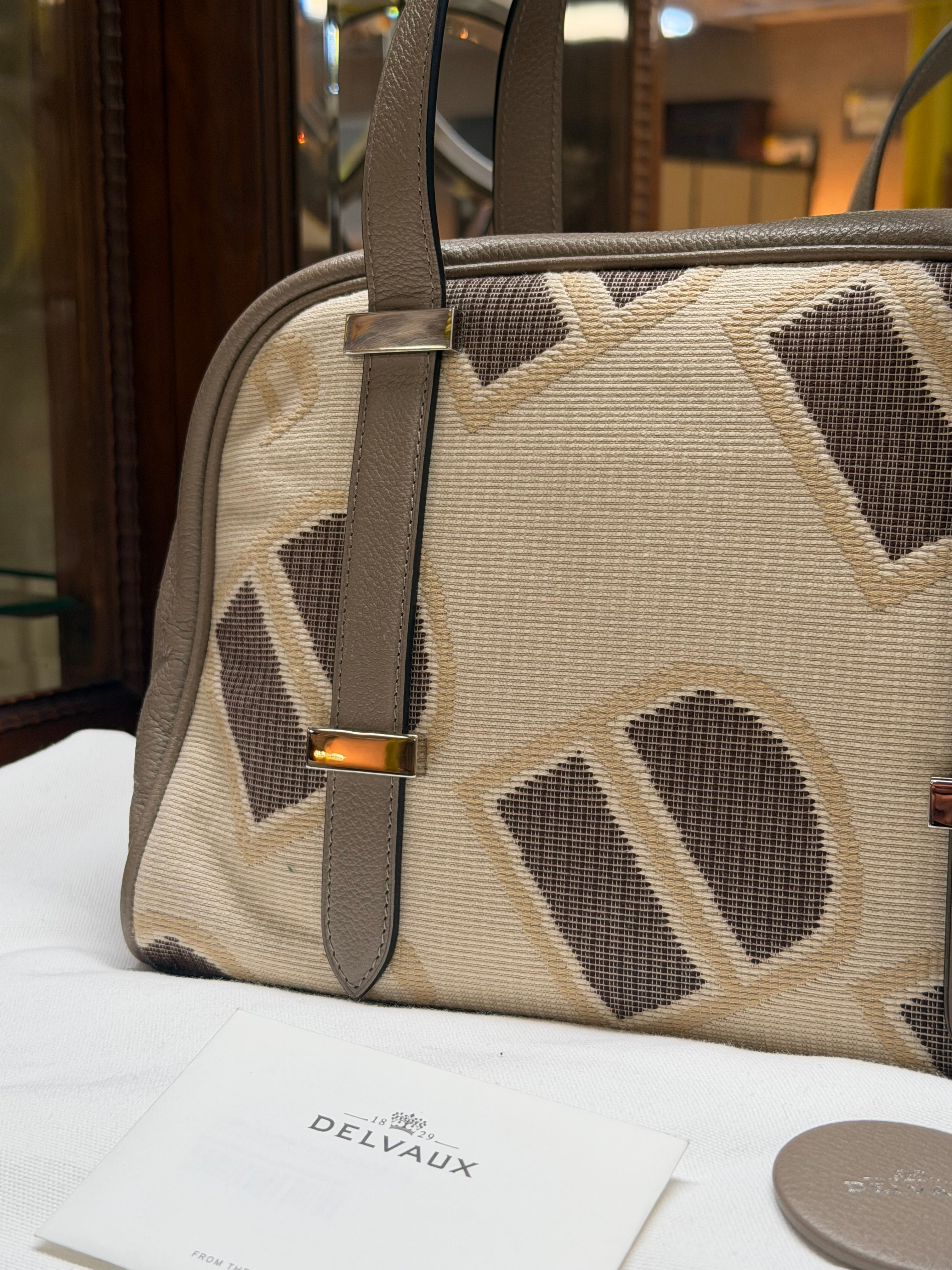 Delvaux Carry-All Mini Toile Logotypée D Travel Tourterelle – New with Certificate, Dust Bag & Mirror