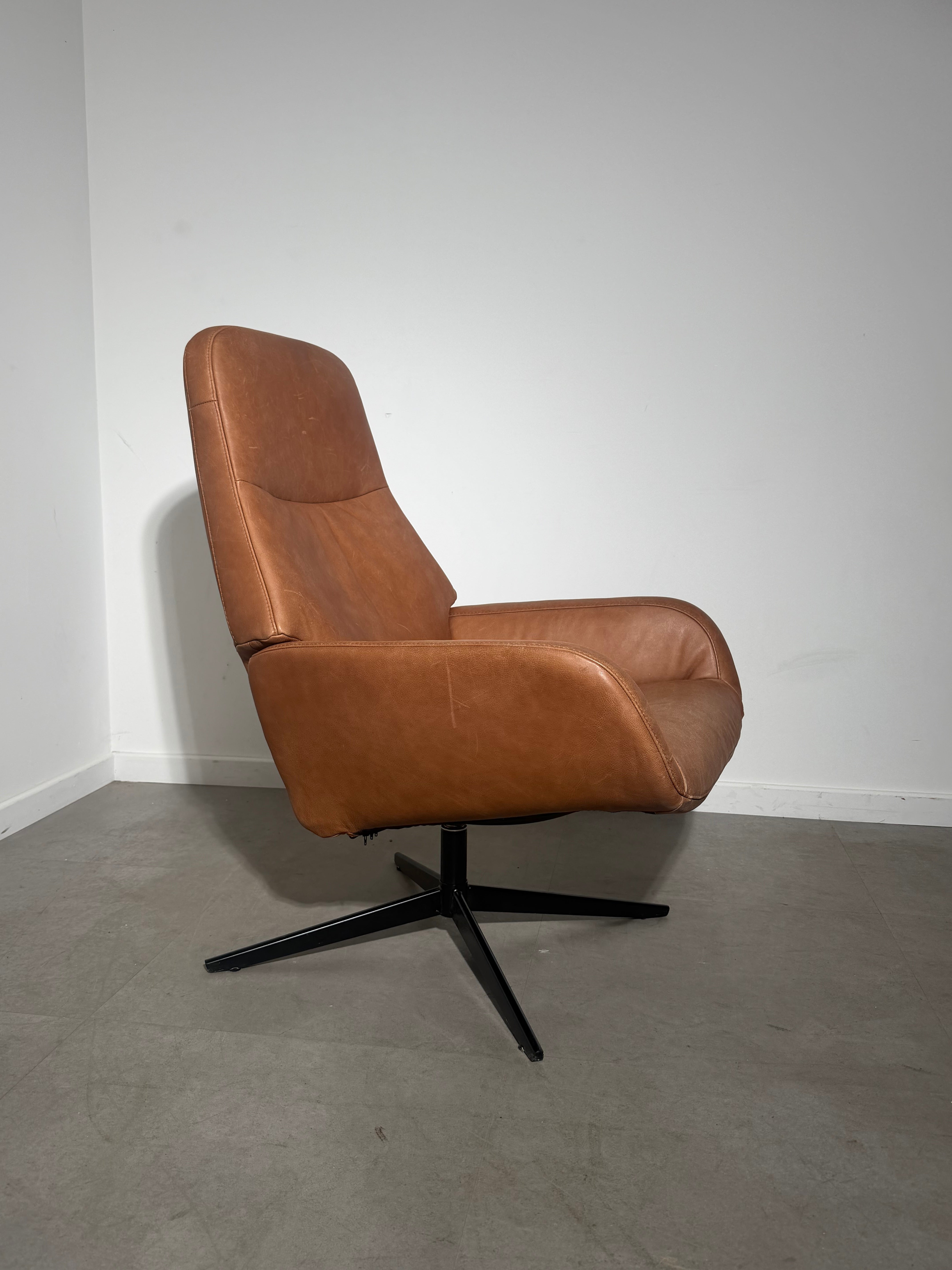 Montèl Cognac Leather Swivel Relax Armchair