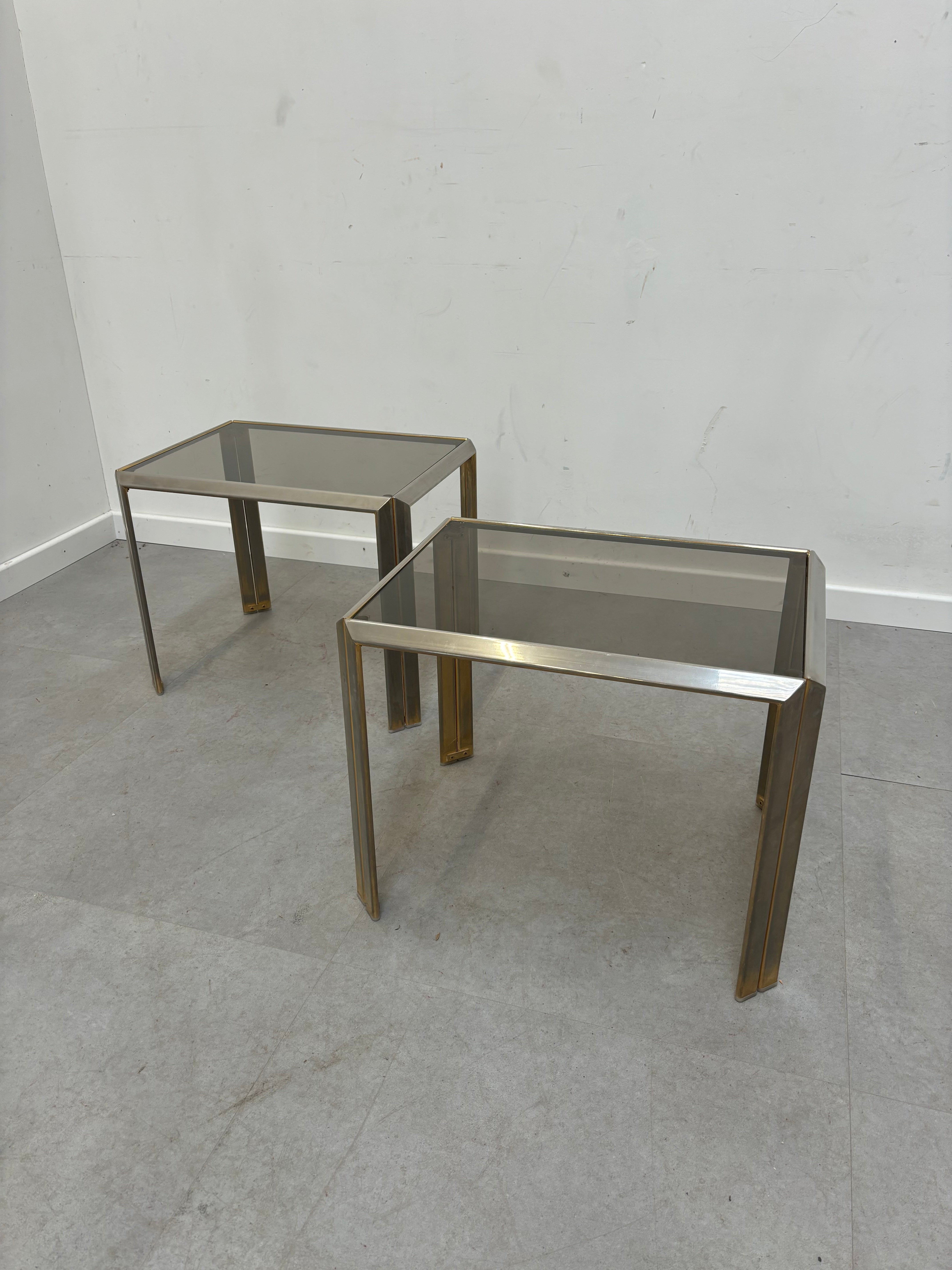 Pair sidetables brass and fume glass