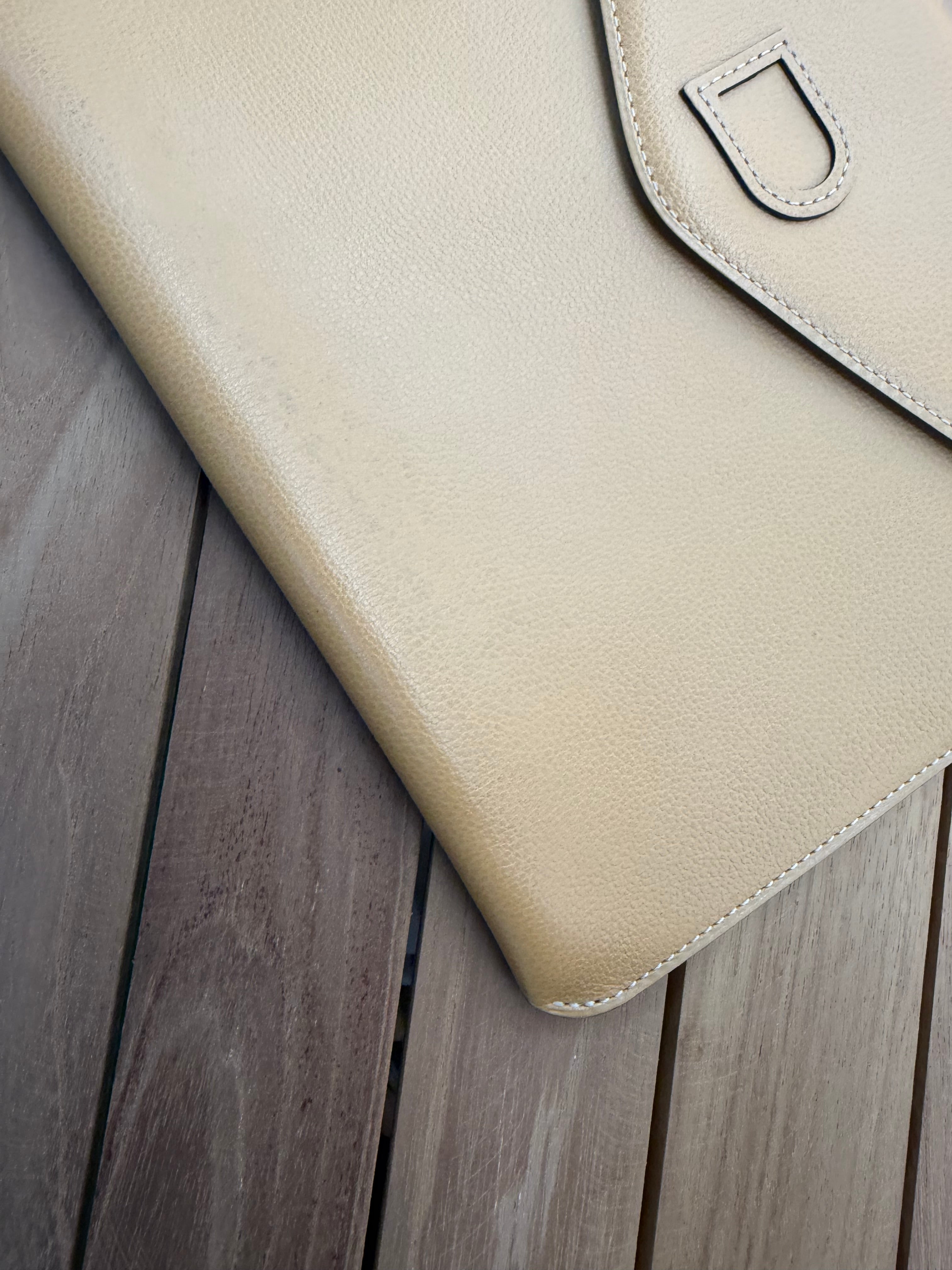 Delvaux “Fusée” Clutch – Cognac Leather