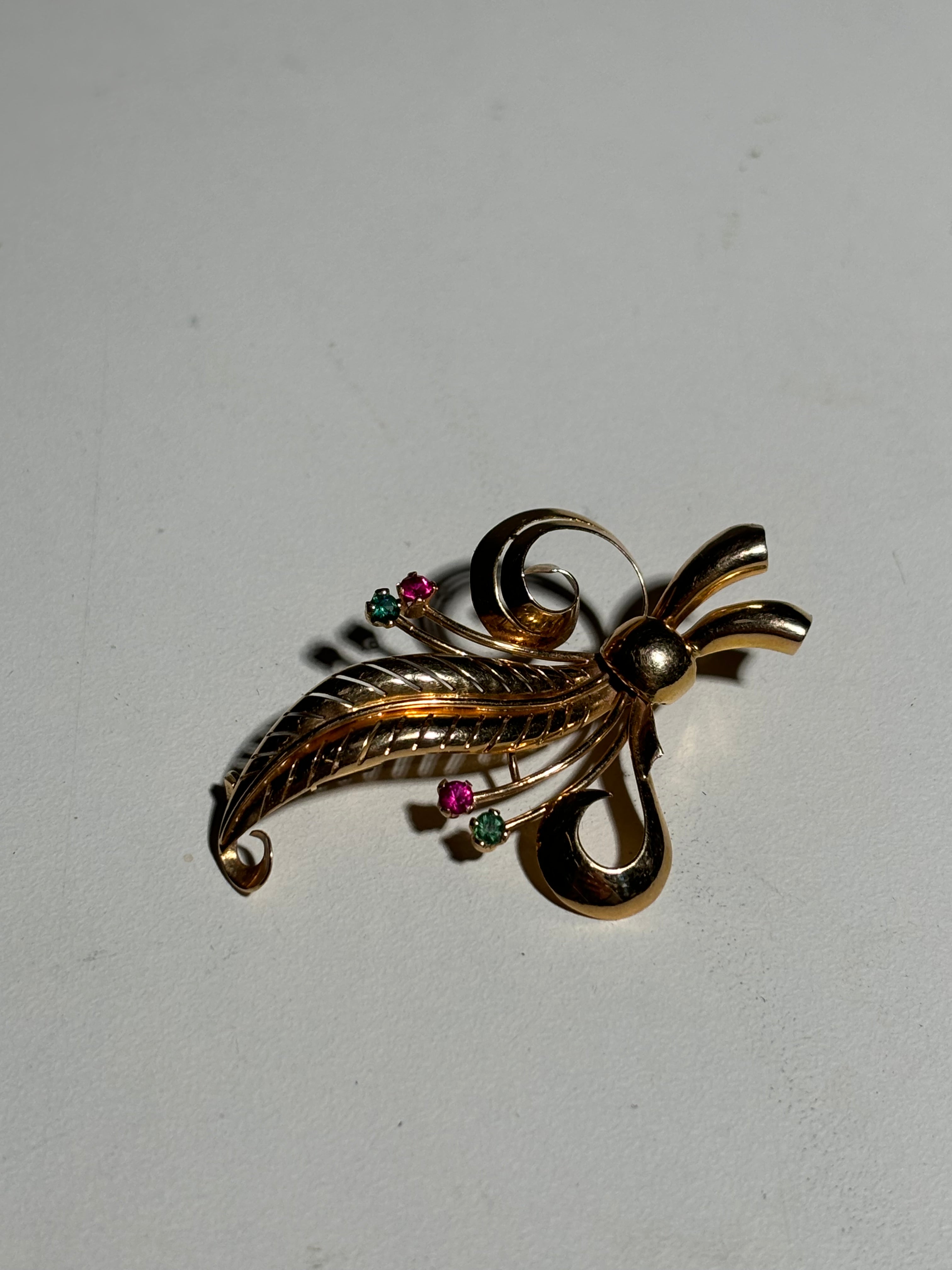 18Kt. Gold broche with ruby & emerald