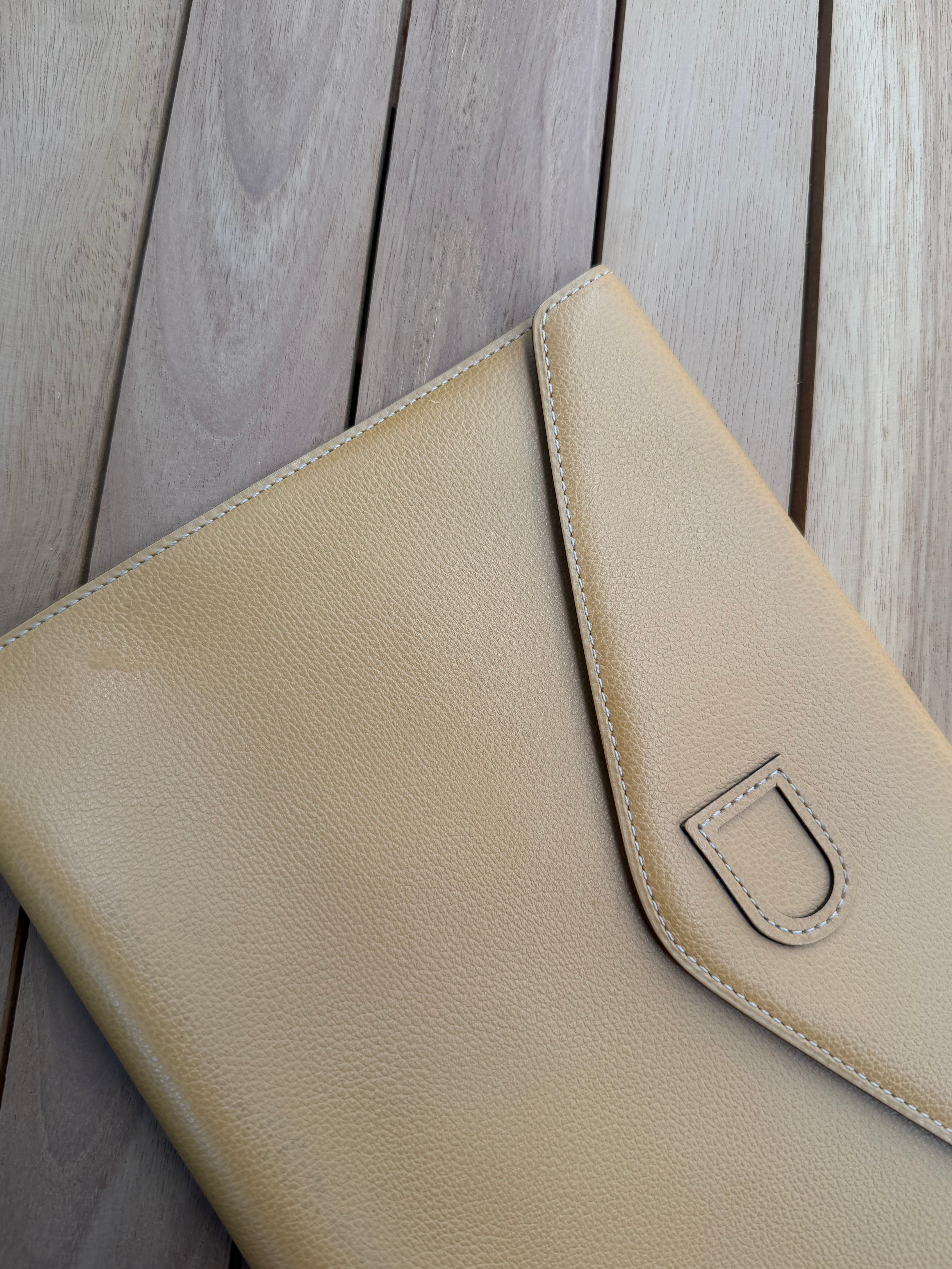 Delvaux “Fusée” Clutch – Cognac Leather