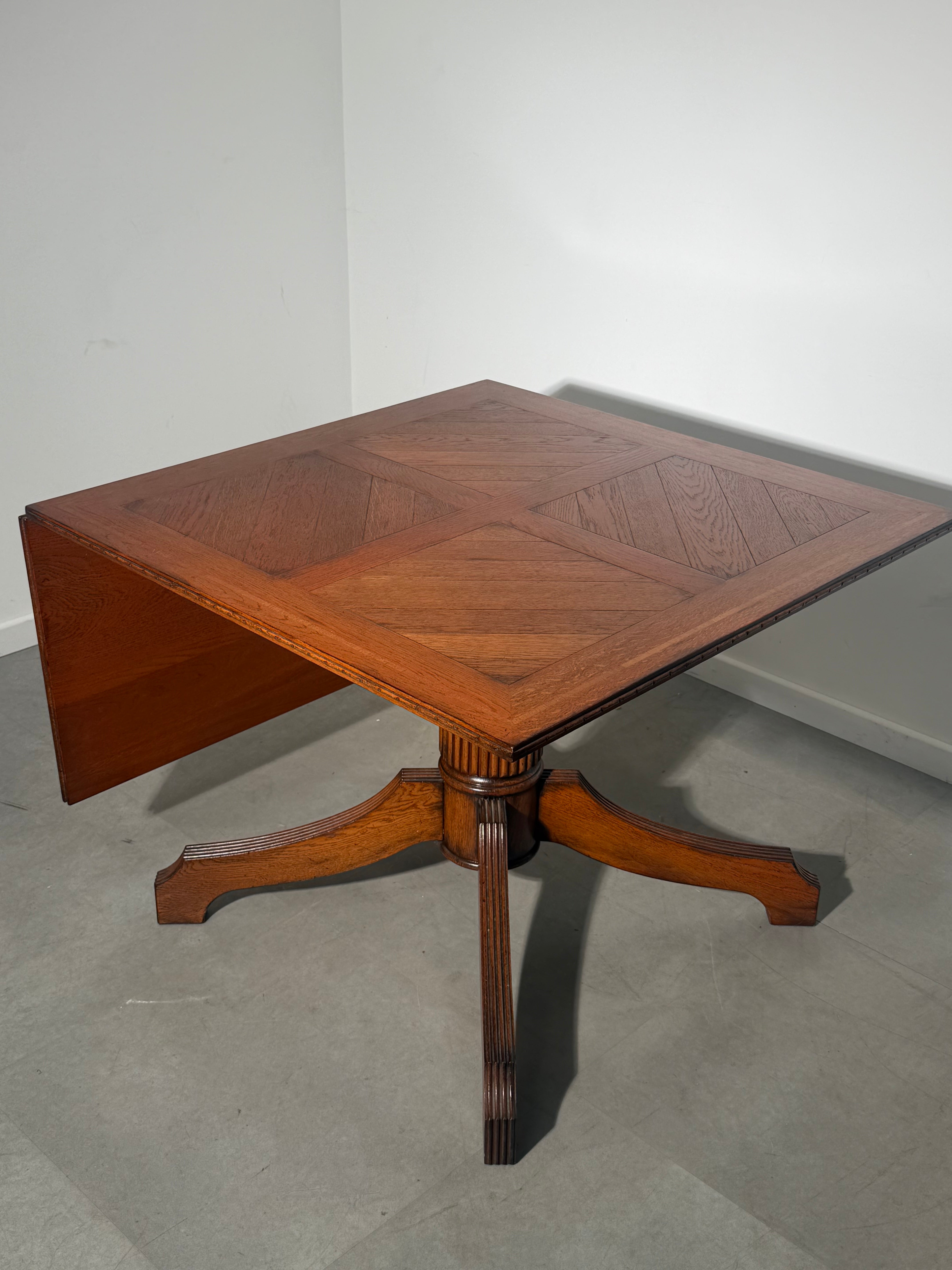 Antique Oak Dining Table with Extendable Leaf