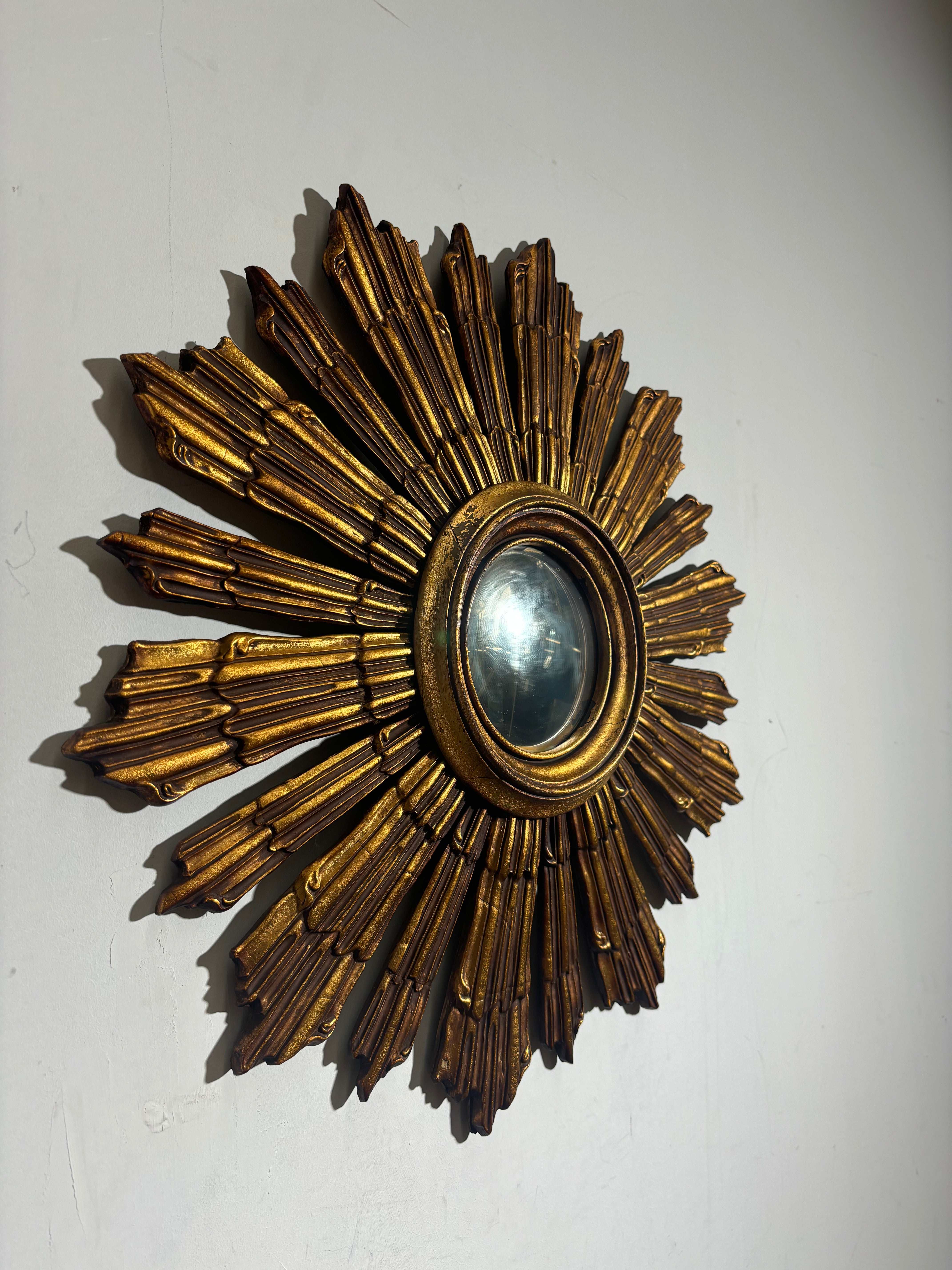 Vintage sunburst convex mirror