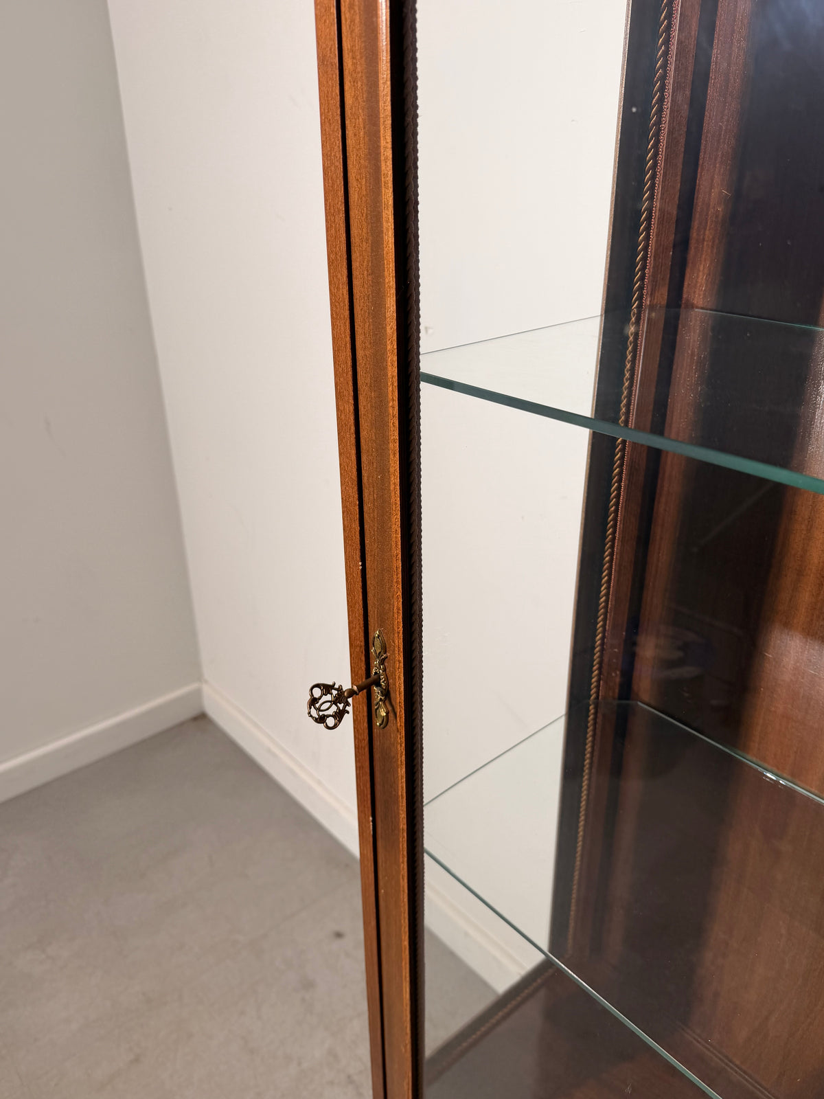 Louis XVI Style Glass Display Cabinet with Decorative Metal Mounts