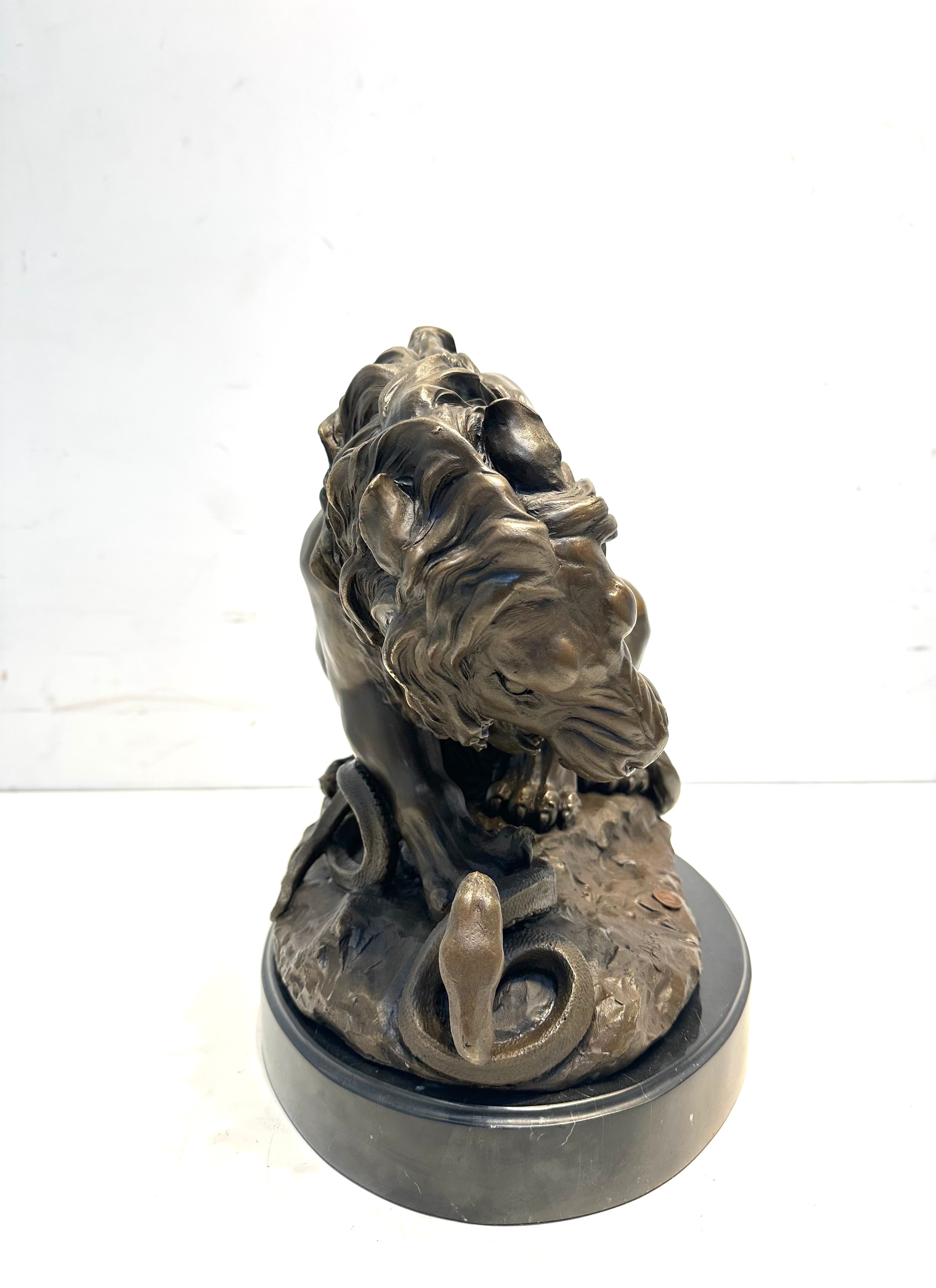 Bronze Sculpture “Lion Attacking a Snake” Signed