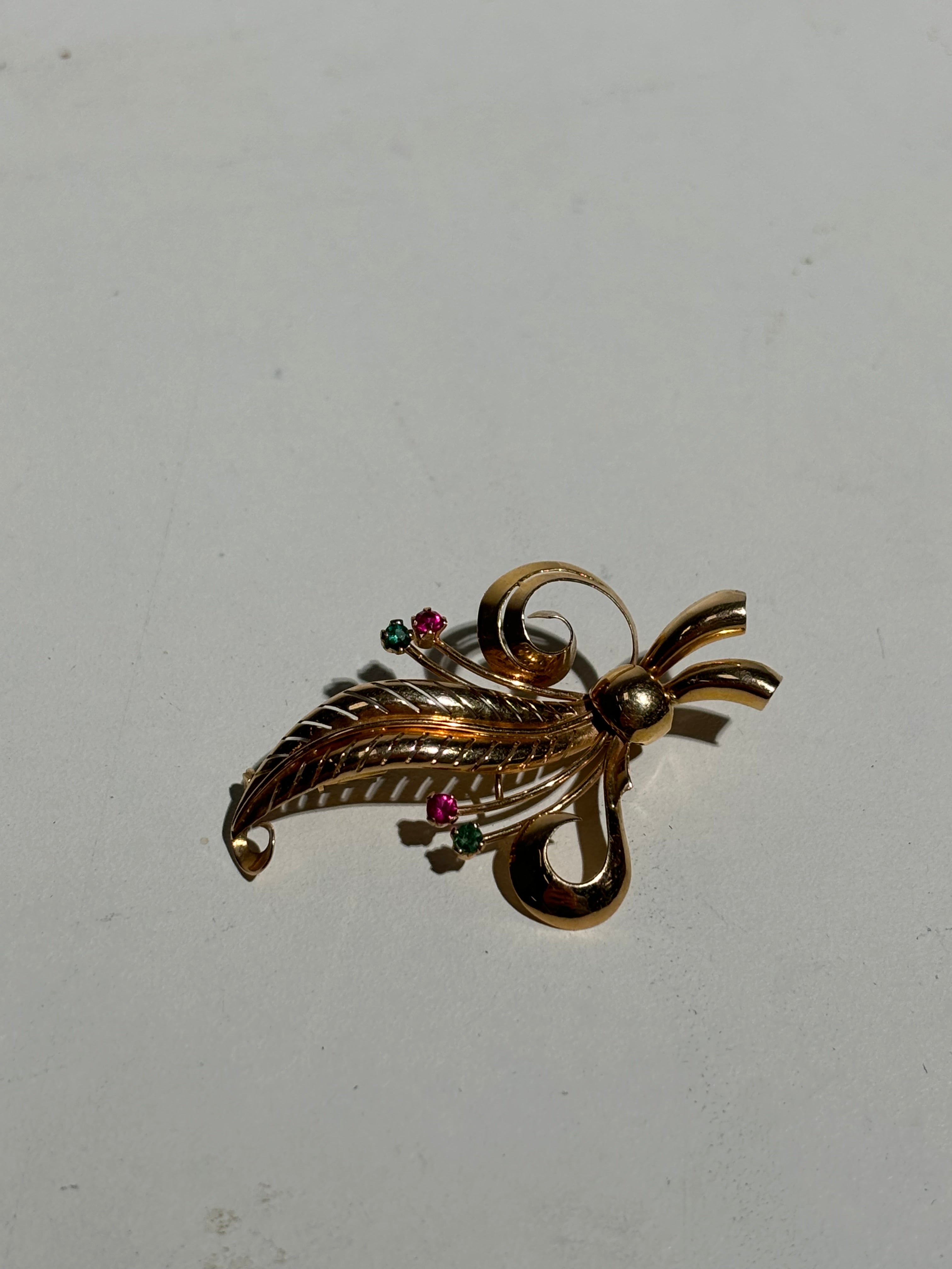 18Kt. Gold broche with ruby & emerald