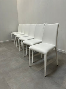Set of six all white leather chairs