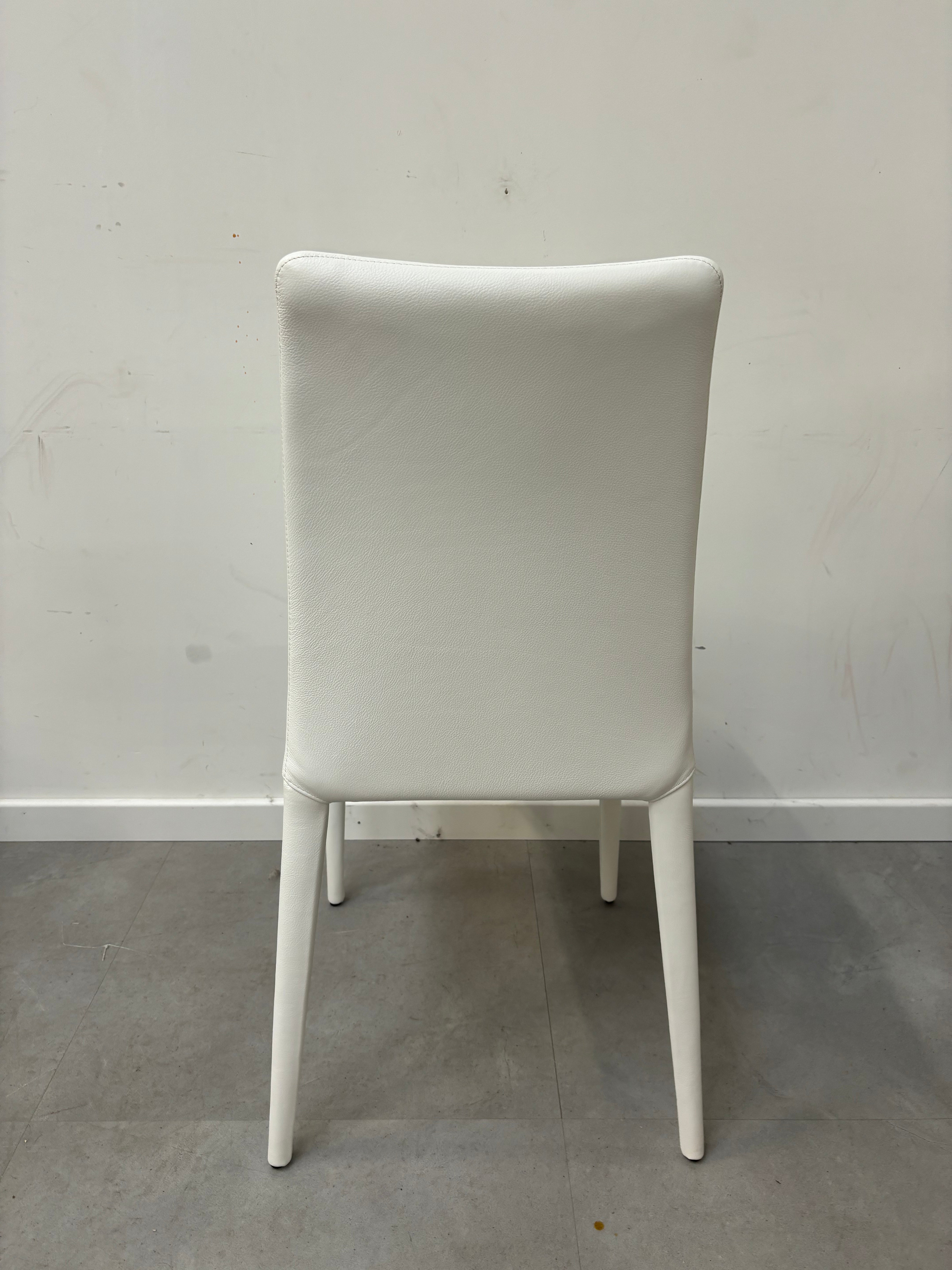 Set of six all white leather chairs