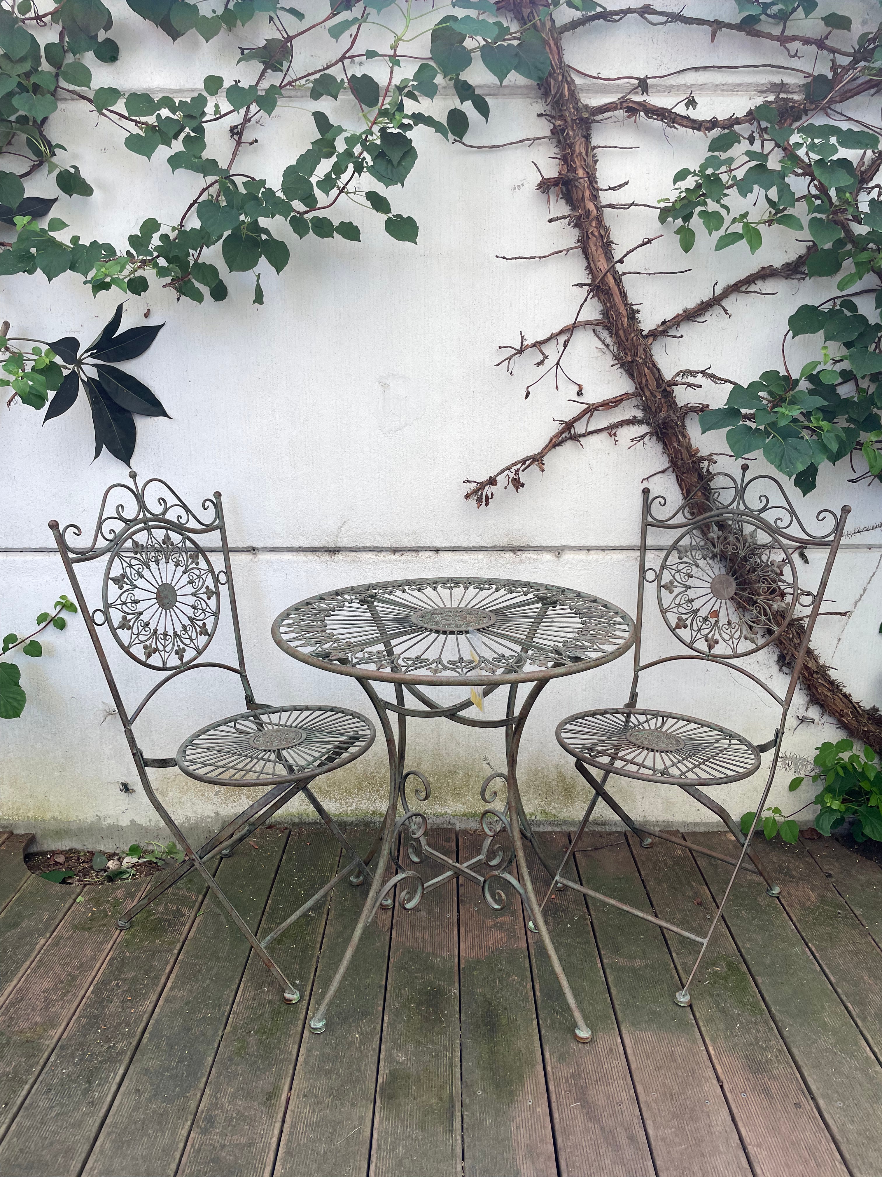 Fer Forge Garden set table with two chairs