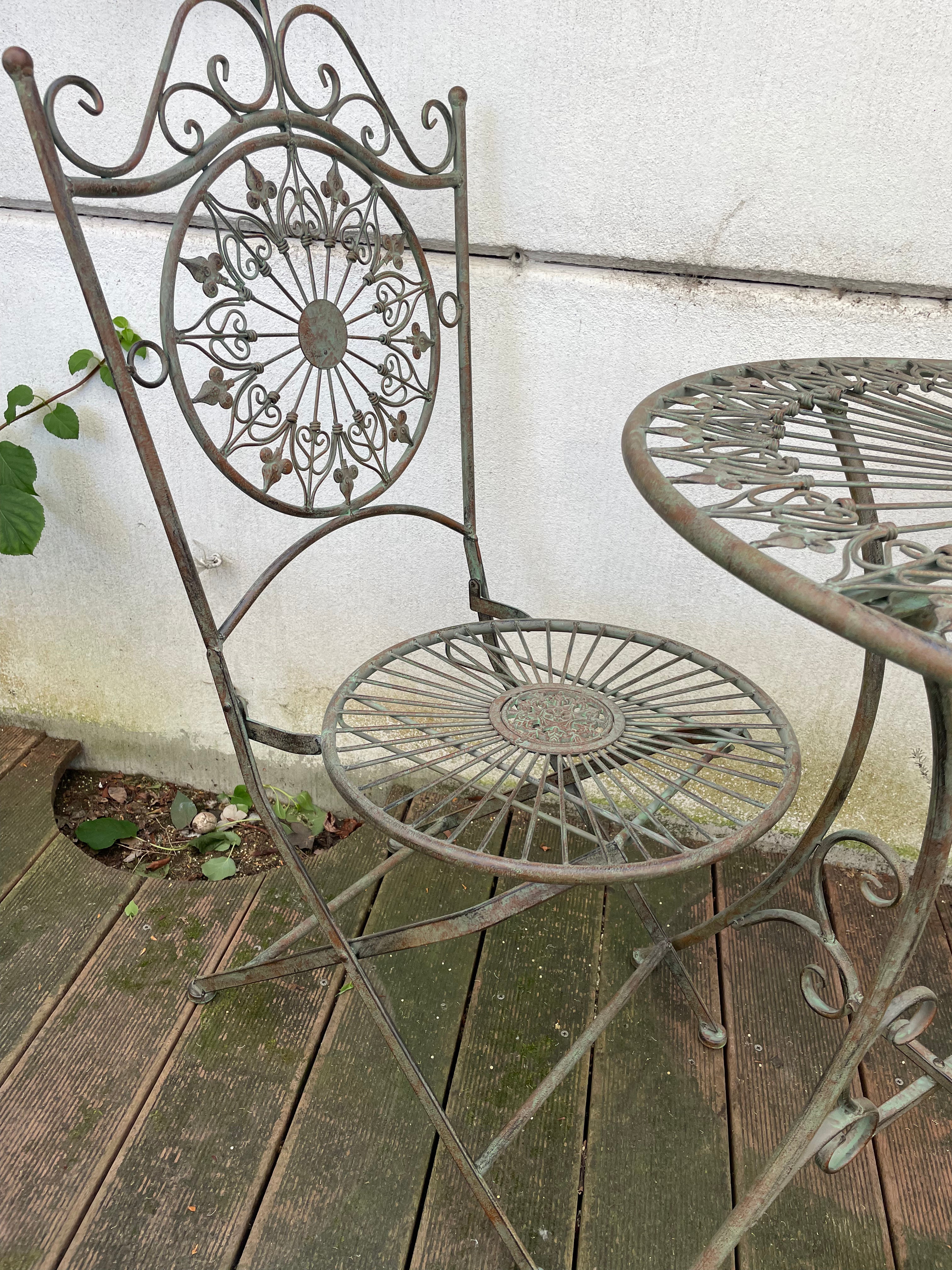 Fer Forge Garden set table with two chairs