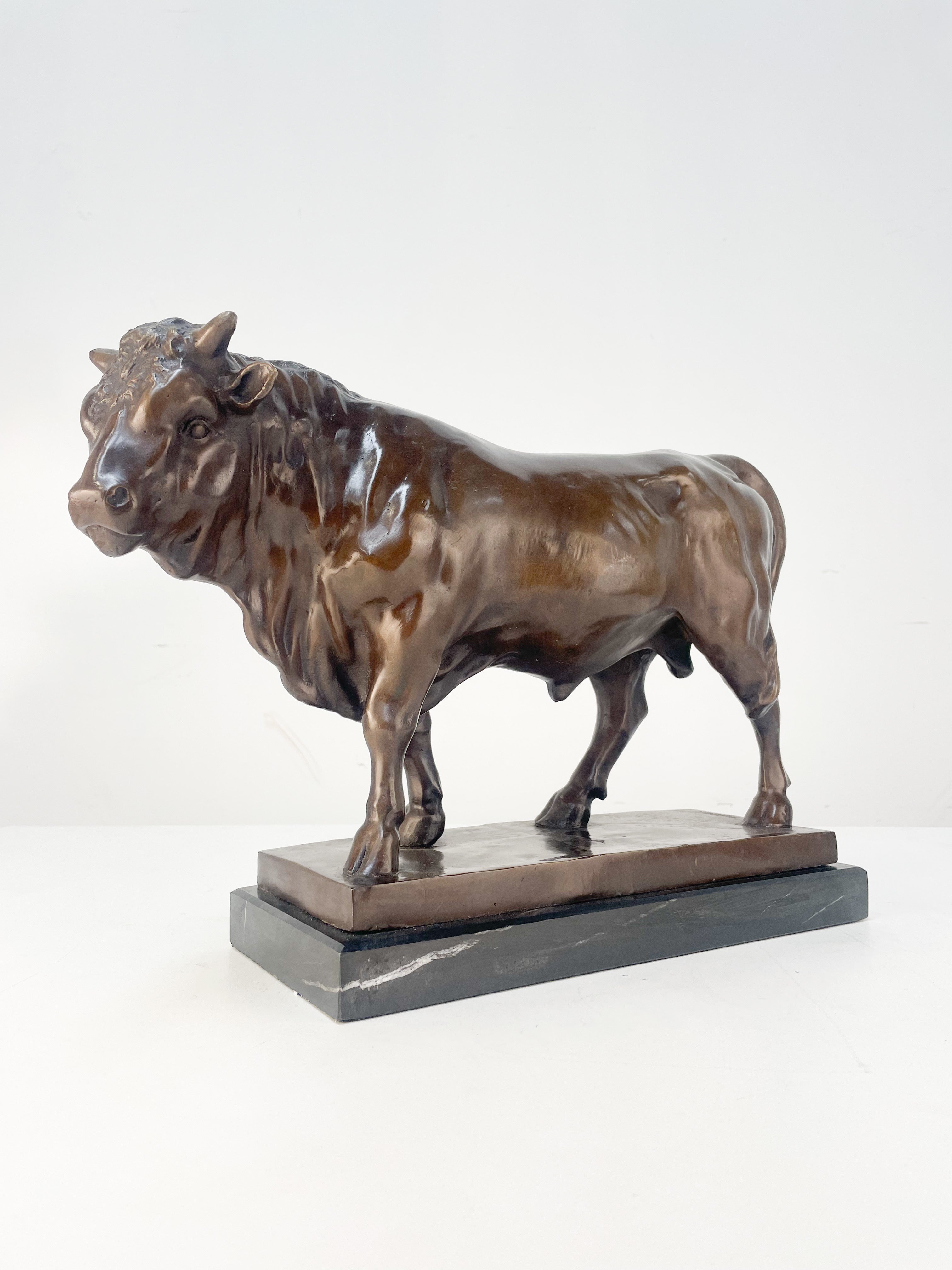 Bronze Bull on marble pedestal